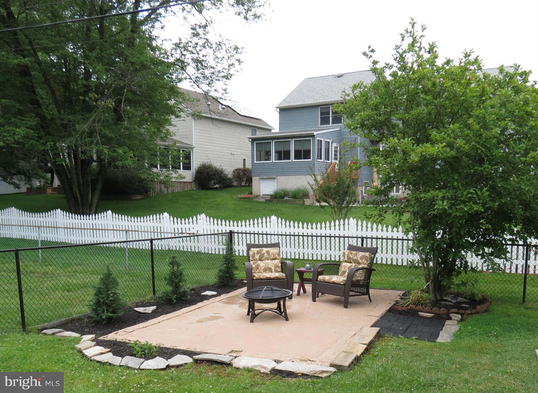 549 Forest View Road Linthicum Heights, MD 21090 - Photo 29 of 30 a view of a chair and table in the garden