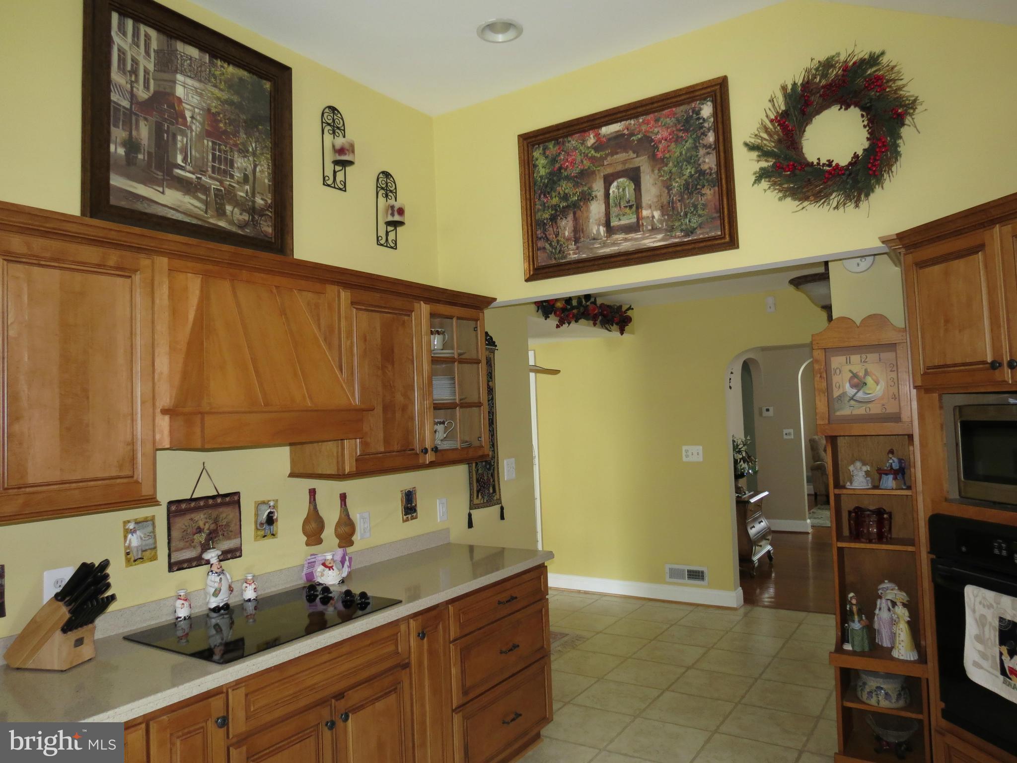 549 Forest View Road Linthicum Heights, MD 21090 - Photo 4 of 30 a kitchen with stainless steel appliances a stove top oven