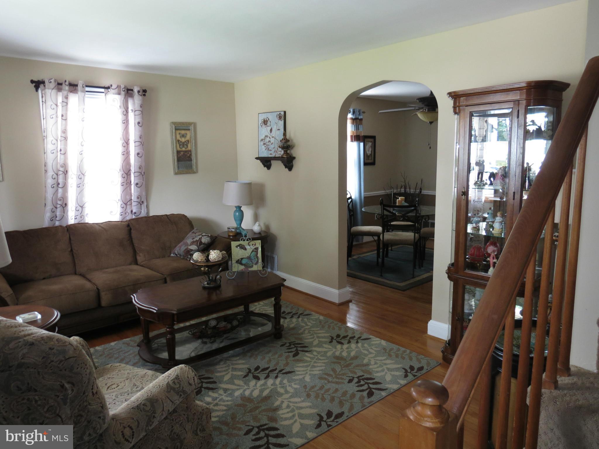 549 Forest View Road Linthicum Heights, MD 21090 - Photo 7 of 30 a living room with furniture and a window