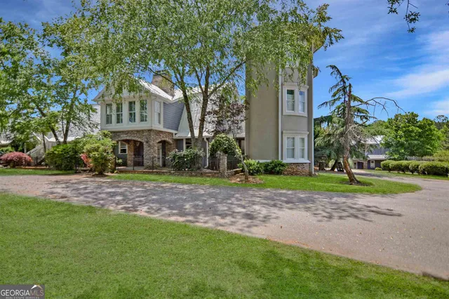 a couple of table and chairs in the garden