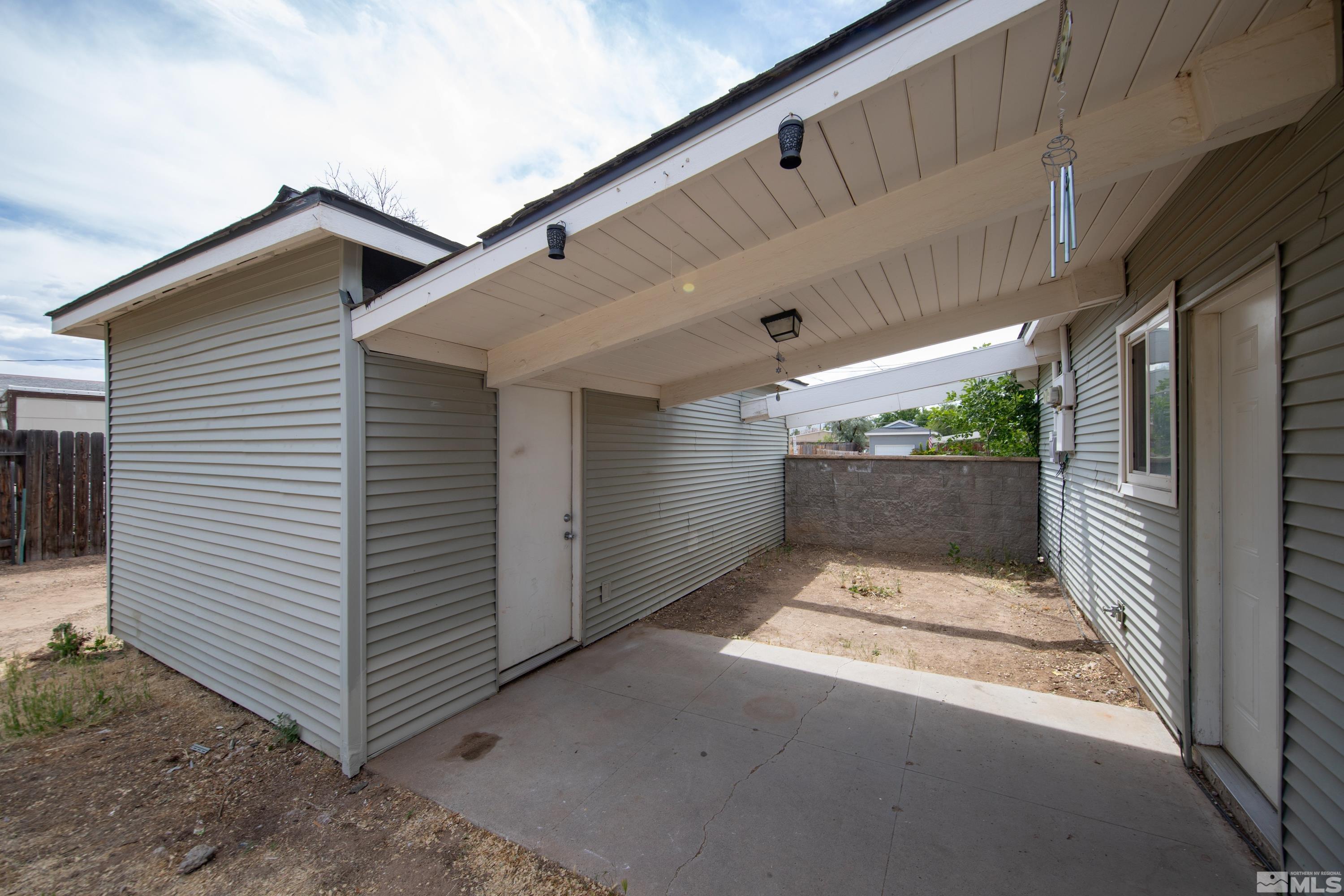 12000 Rocky Mountain Street Reno, NV 89506 - Photo 22 of 40 a view of backyard and utility house