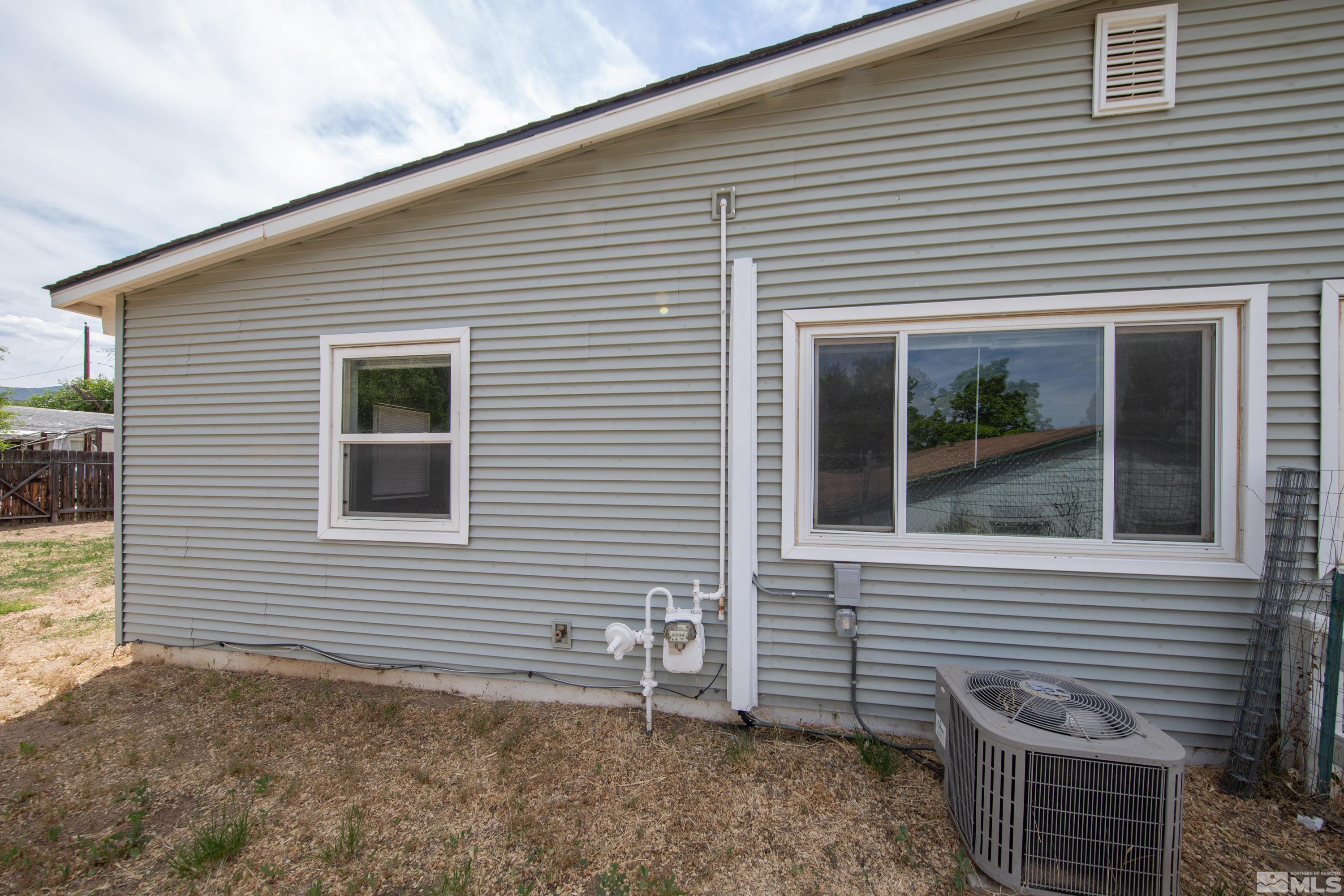 12000 Rocky Mountain Street Reno, NV 89506 - Photo 29 of 40 a view of a house with a yard and garage