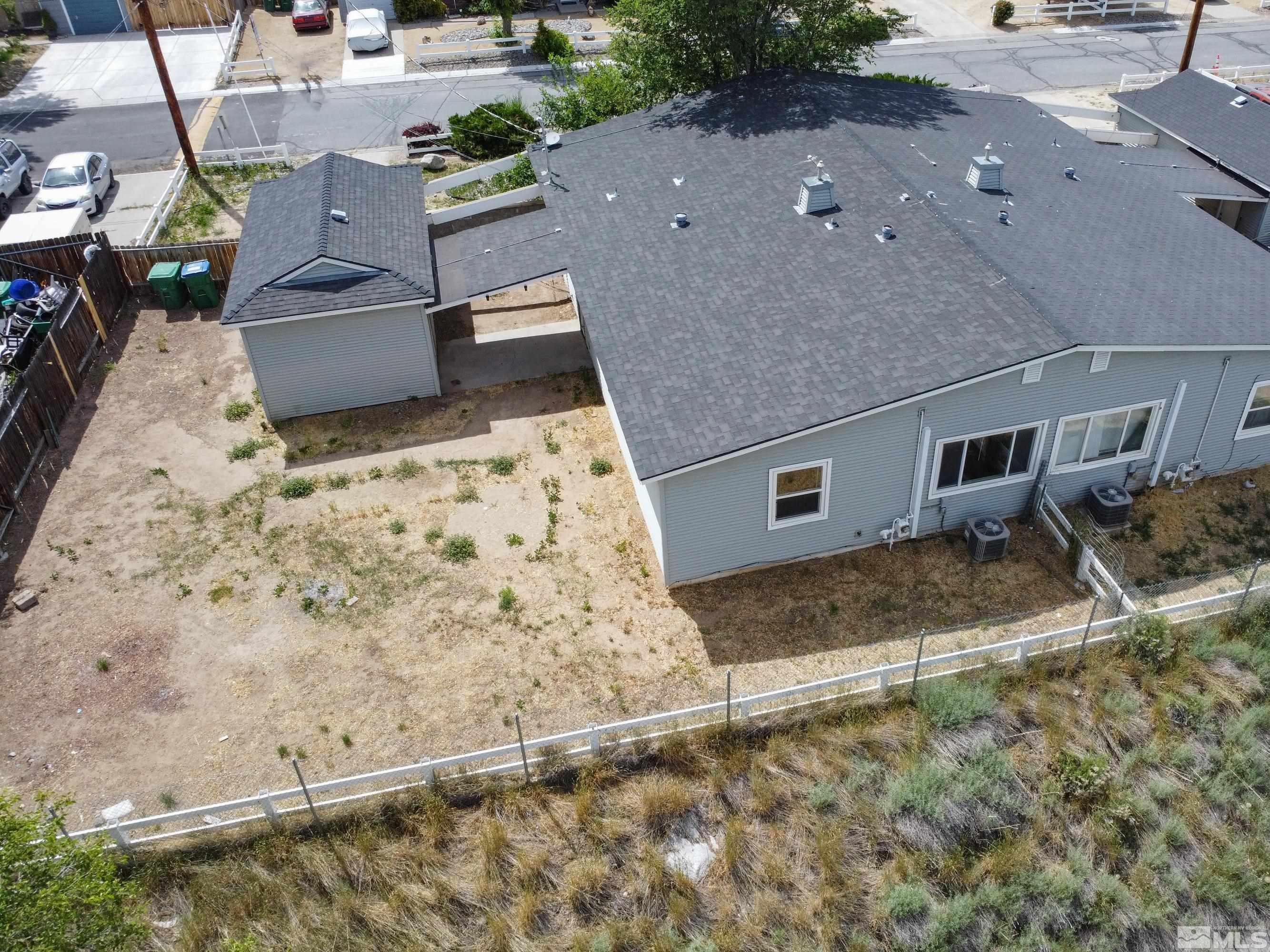 12000 Rocky Mountain Street Reno, NV 89506 - Photo 3 of 40 an aerial view of a house with a yard