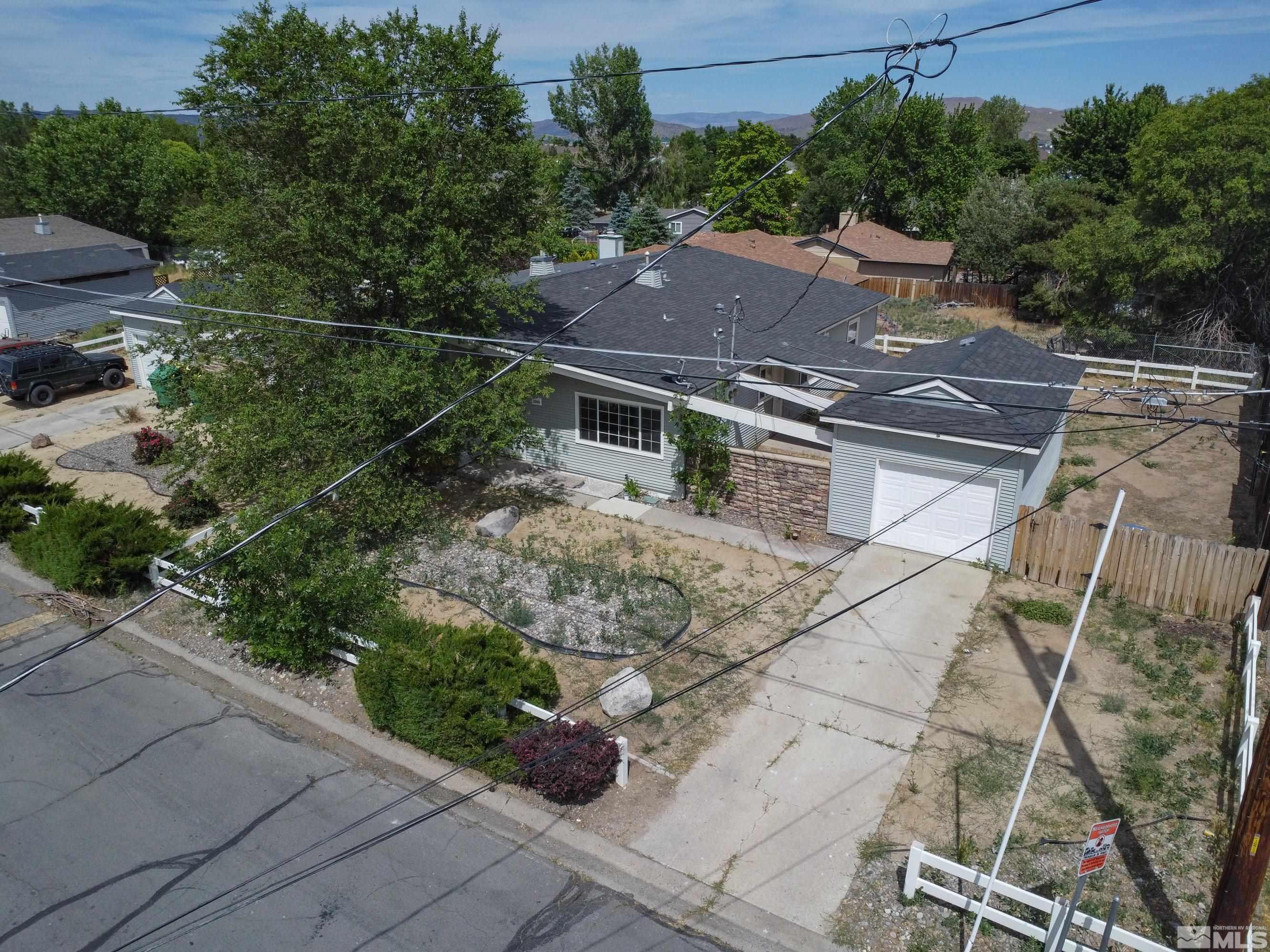 12000 Rocky Mountain Street Reno, NV 89506 - Photo 31 of 40 a view of a house with a yard