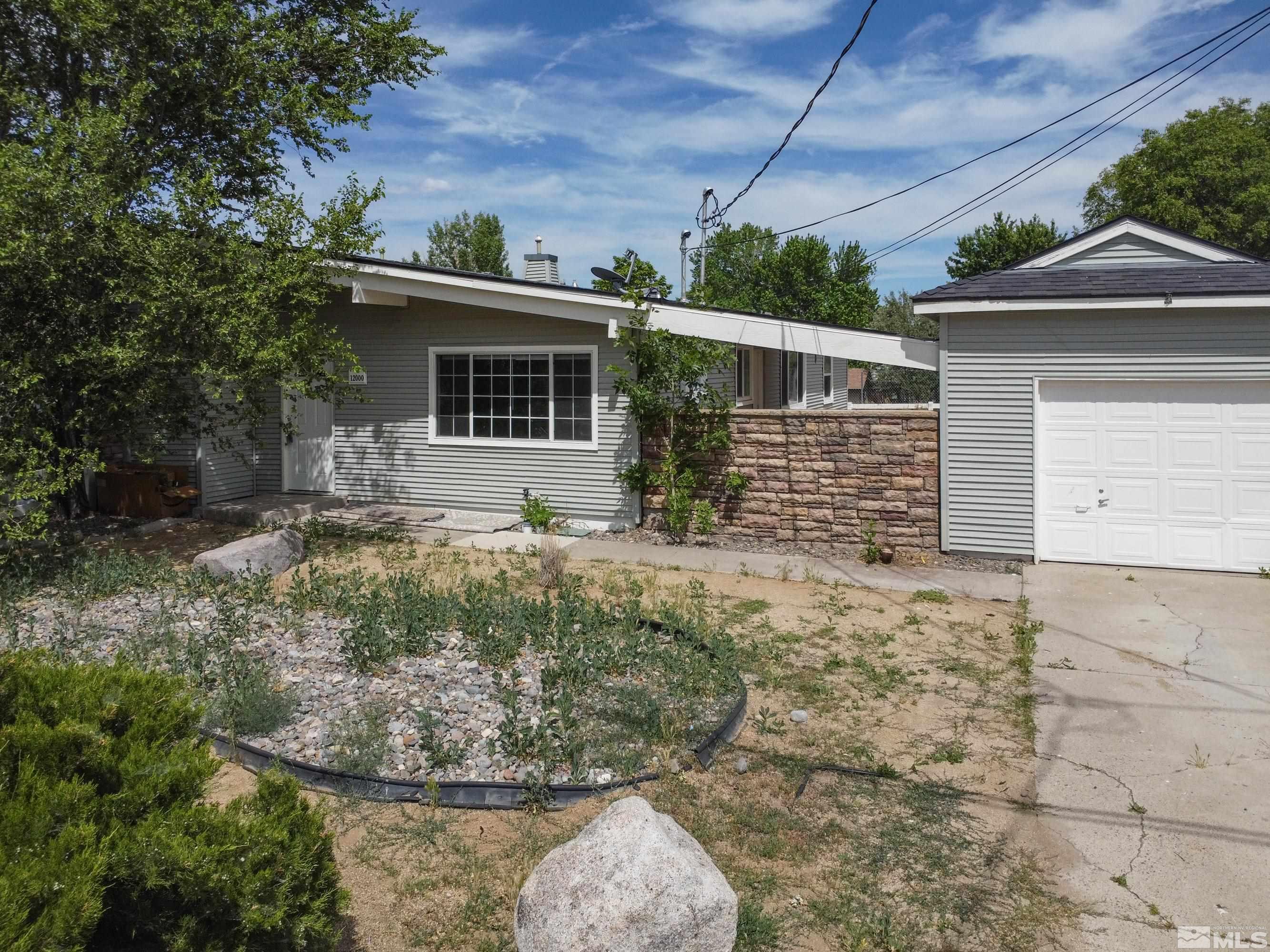 12000 Rocky Mountain Street Reno, NV 89506 - Photo 33 of 40 a view of a house with backyard