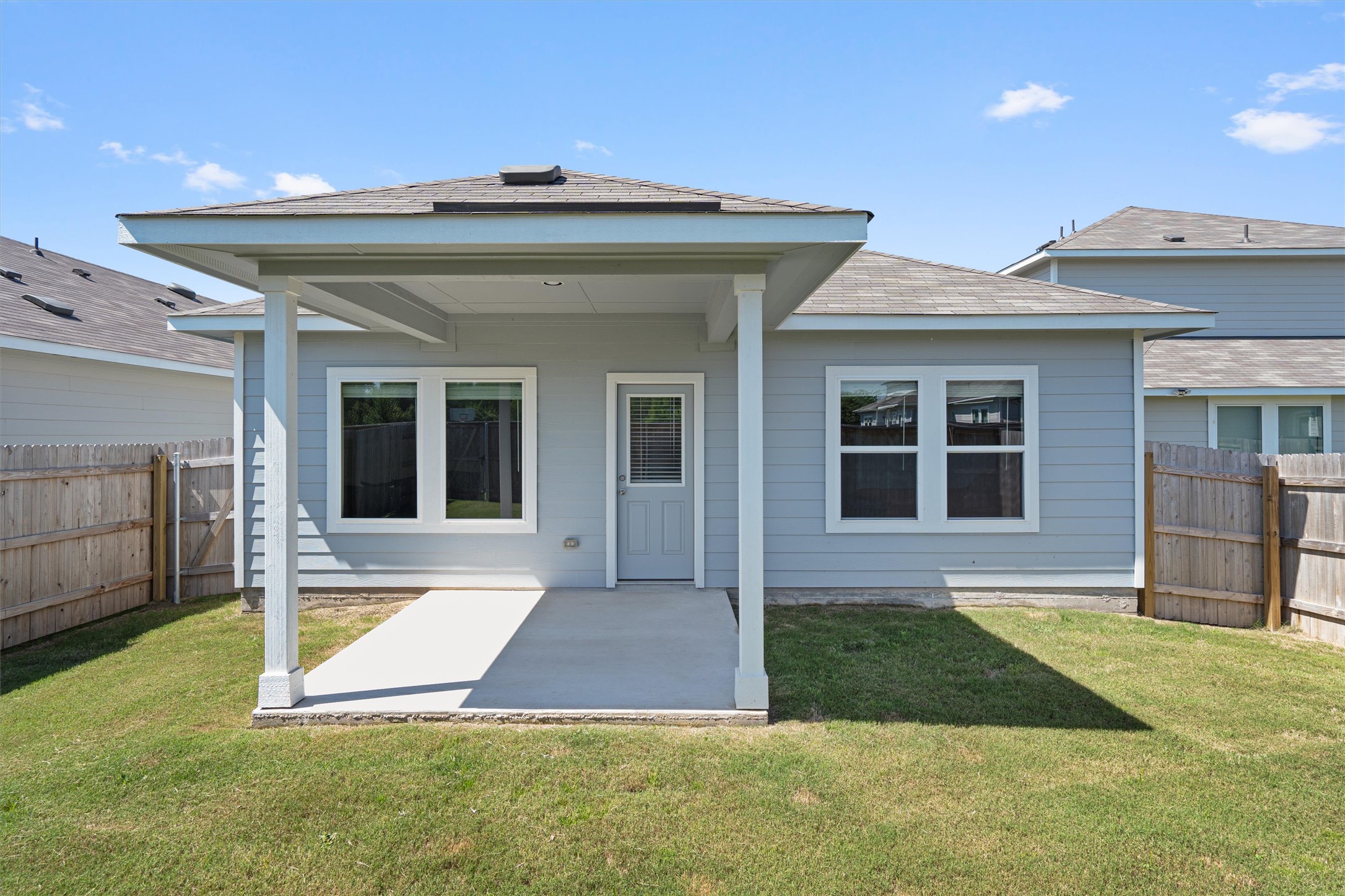 2606 Totley Road Manor, TX 78653 - Photo 23 of 28 a view of front a house with a yard