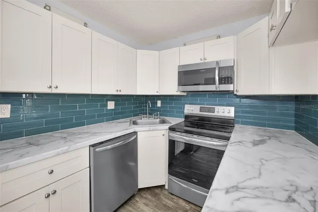 $138,900 | 2687 Pine Ridge Way South, Unit E1, Palm Harbor, FL 34684