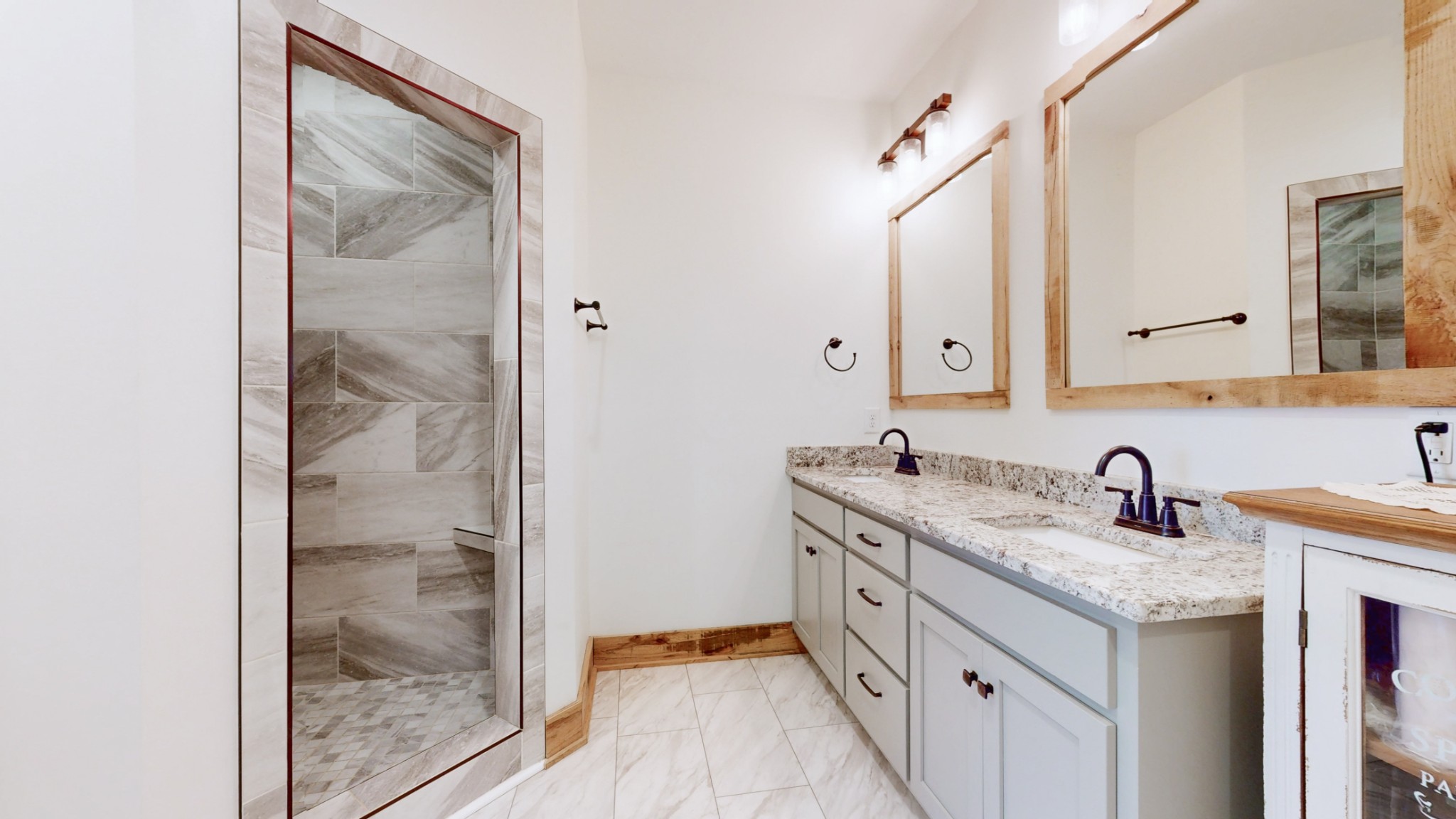 601 King Ridge Road Dowelltown, TN 37059 - Photo 25 of 49 a bathroom with a granite countertop sink mirror and double
