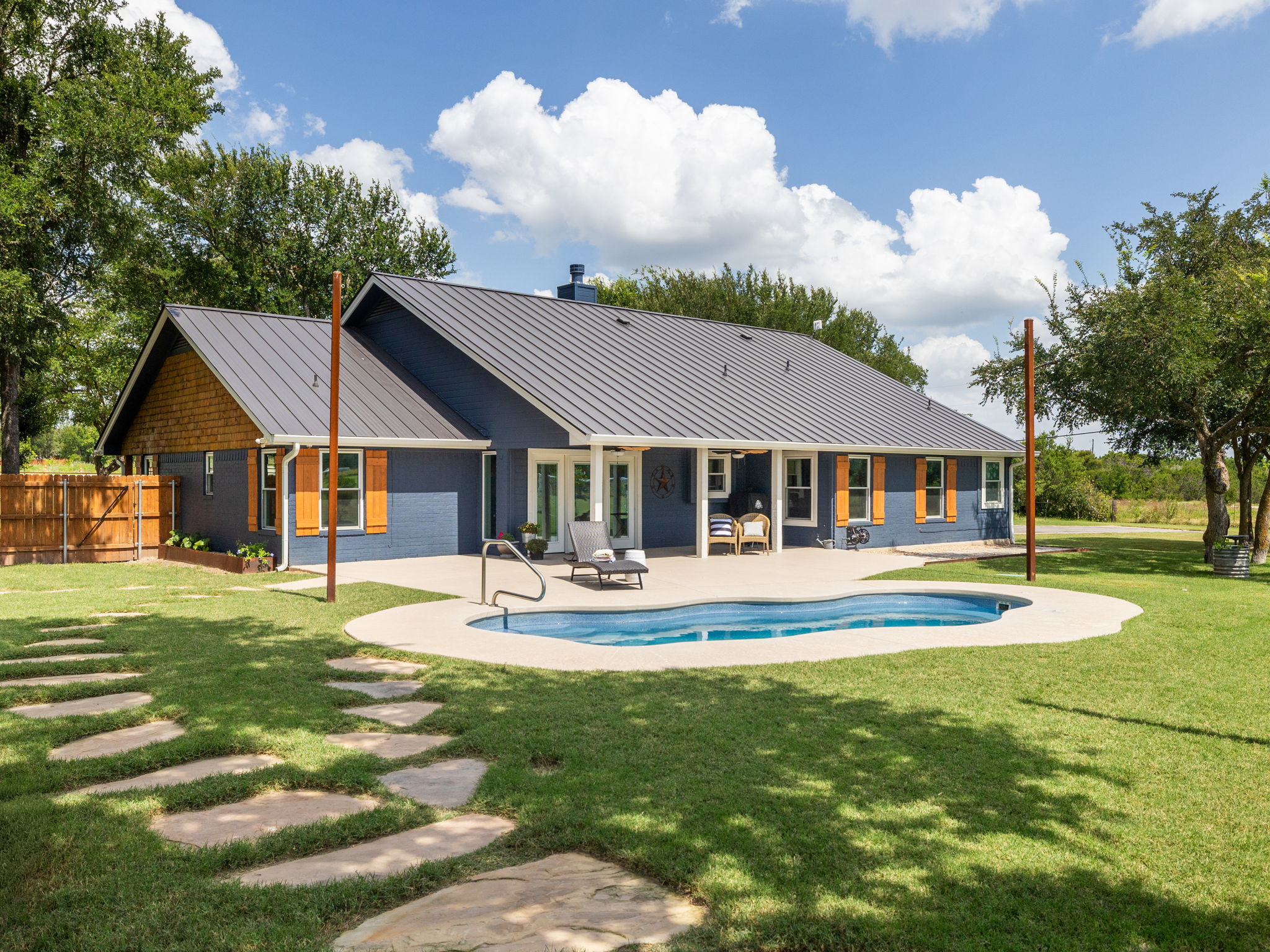 3001 County Road 255 Georgetown, TX 78633 - Photo 21 of 35 A private swimming pool and expansive patio create an idyllic outdoor oasis.
