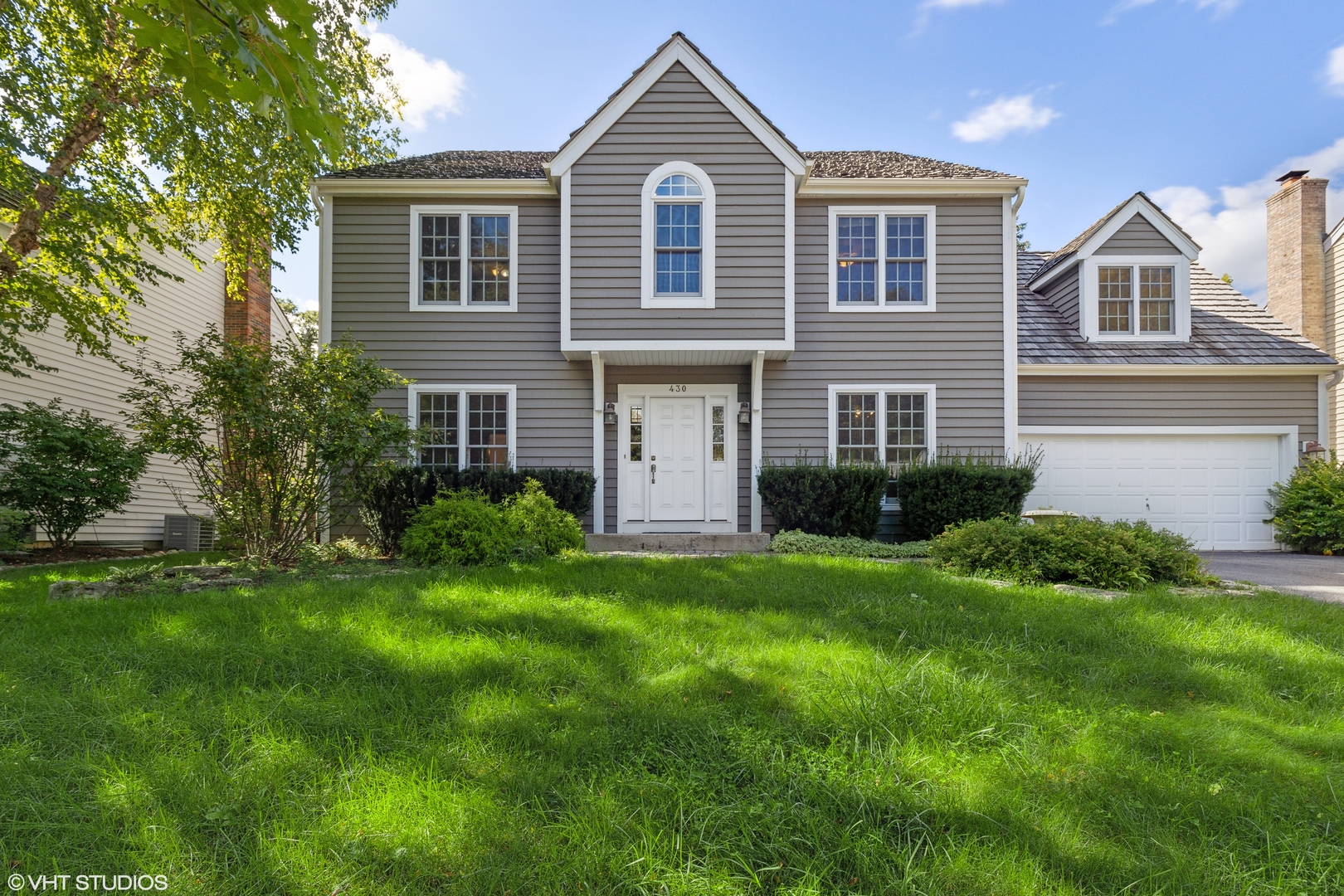 a front of a house with a yard