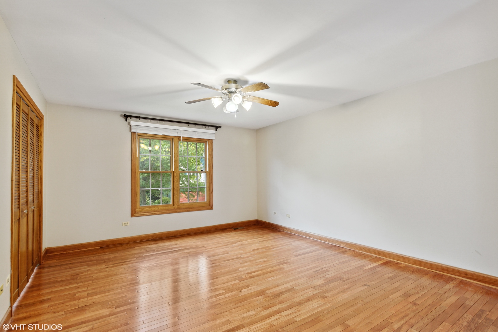 430 Long Hill Road Gurnee, IL 60031 - Photo 14 of 27 wooden floor in an empty room with a window