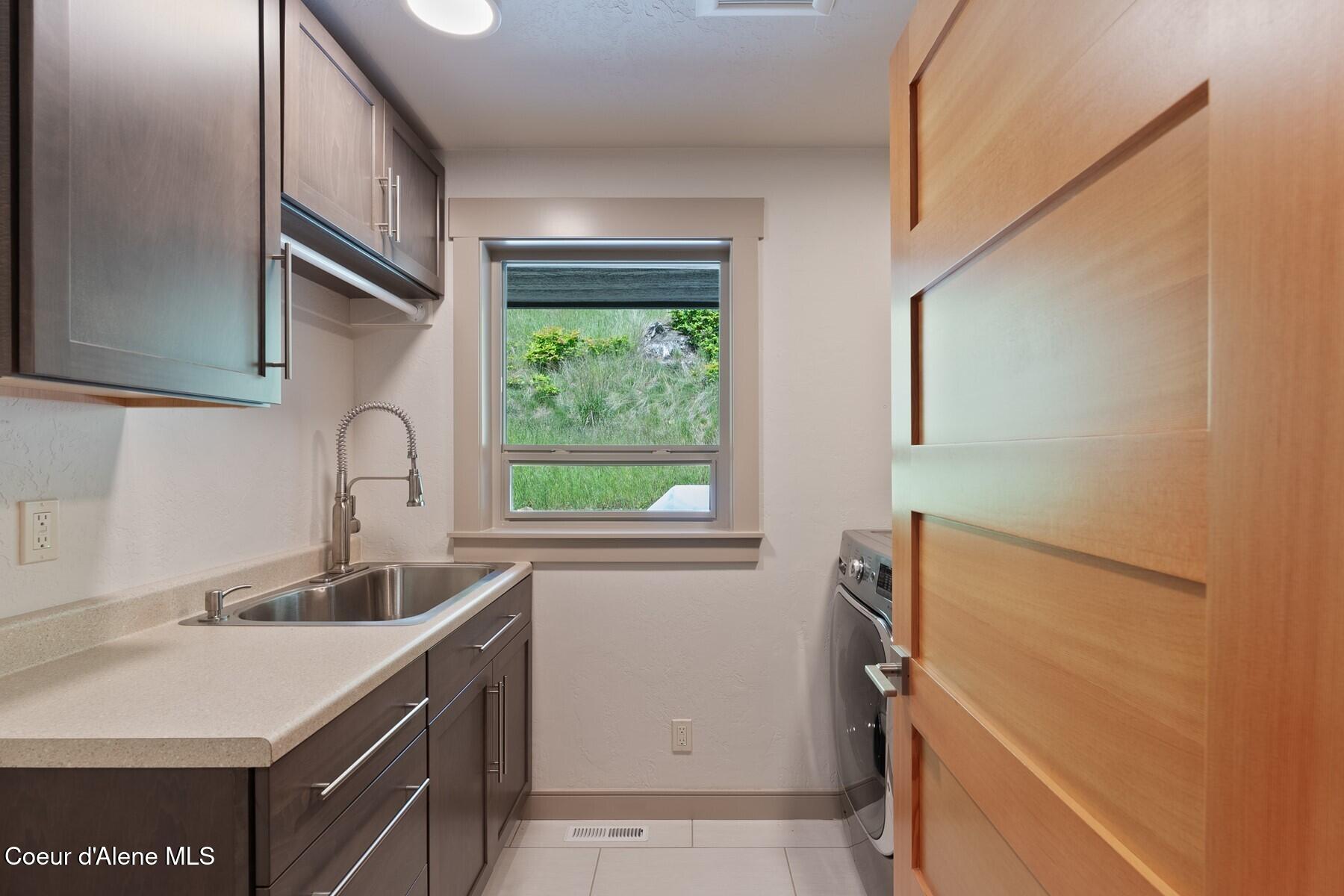 2406-1 South Silver Beach Road Coeur D'Alene, ID 83814 - Photo 26 of 44 Laundry Room Main level