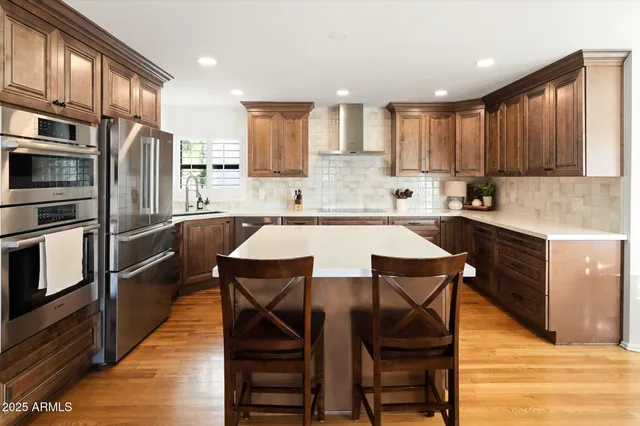a view of a dining room with furniture and window