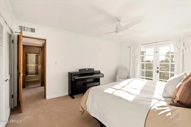 an aerial view of a house with a yard and a sitting area