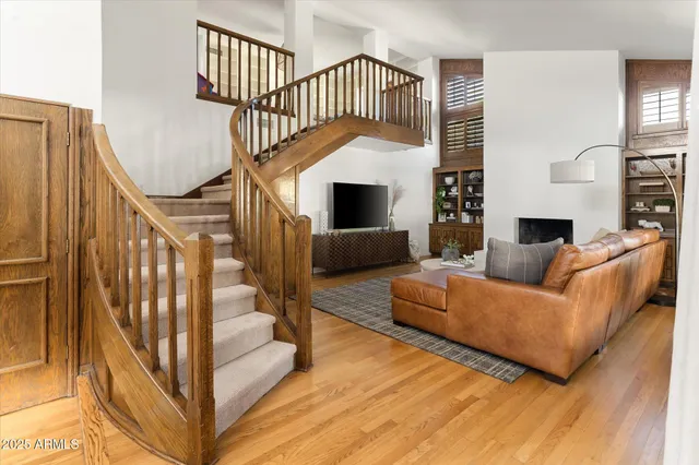 a view of a livingroom with furniture and a flat screen tv