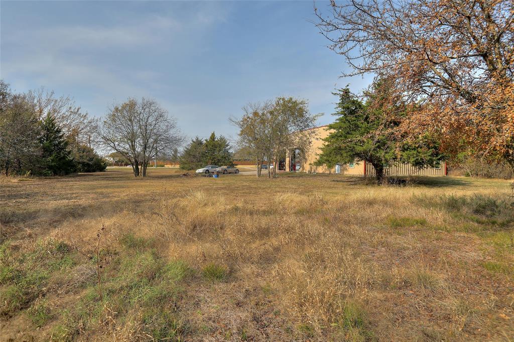 625 Simpson Road Princeton, TX 75407 - Photo 14 of 24 a view of dirt field with trees in the background