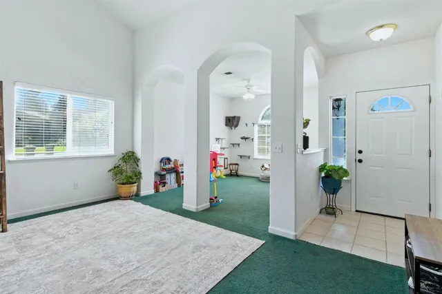 a view of livingroom with furniture and hardwood floor