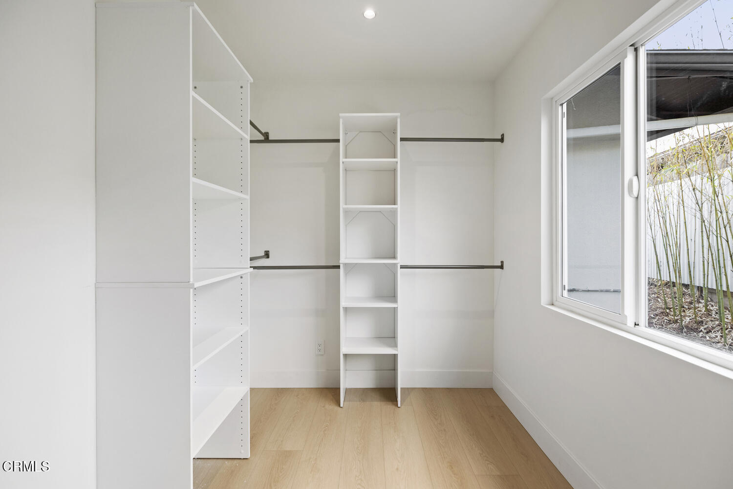 1780 North Altadena Drive Pasadena, CA 91107 - Photo 15 of 34 a view of walk in closet with empty racks