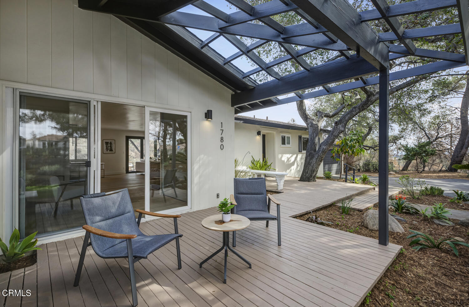 1780 North Altadena Drive Pasadena, CA 91107 - Photo 17 of 34 a view of a patio with couches chairs and wooden floor