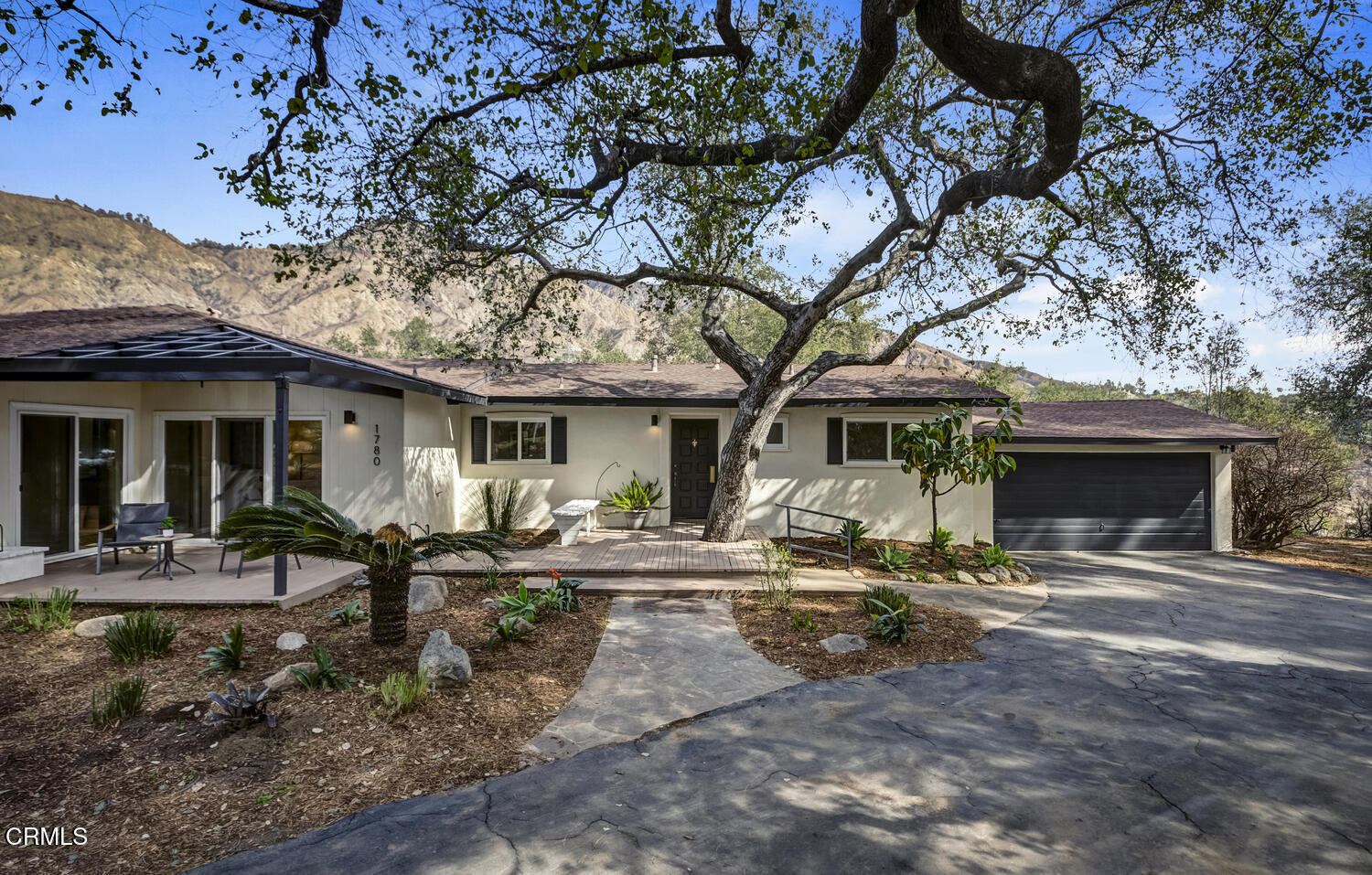1780 North Altadena Drive Pasadena, CA 91107 - Photo 33 of 34 a front view of a house with sitting area and seating space