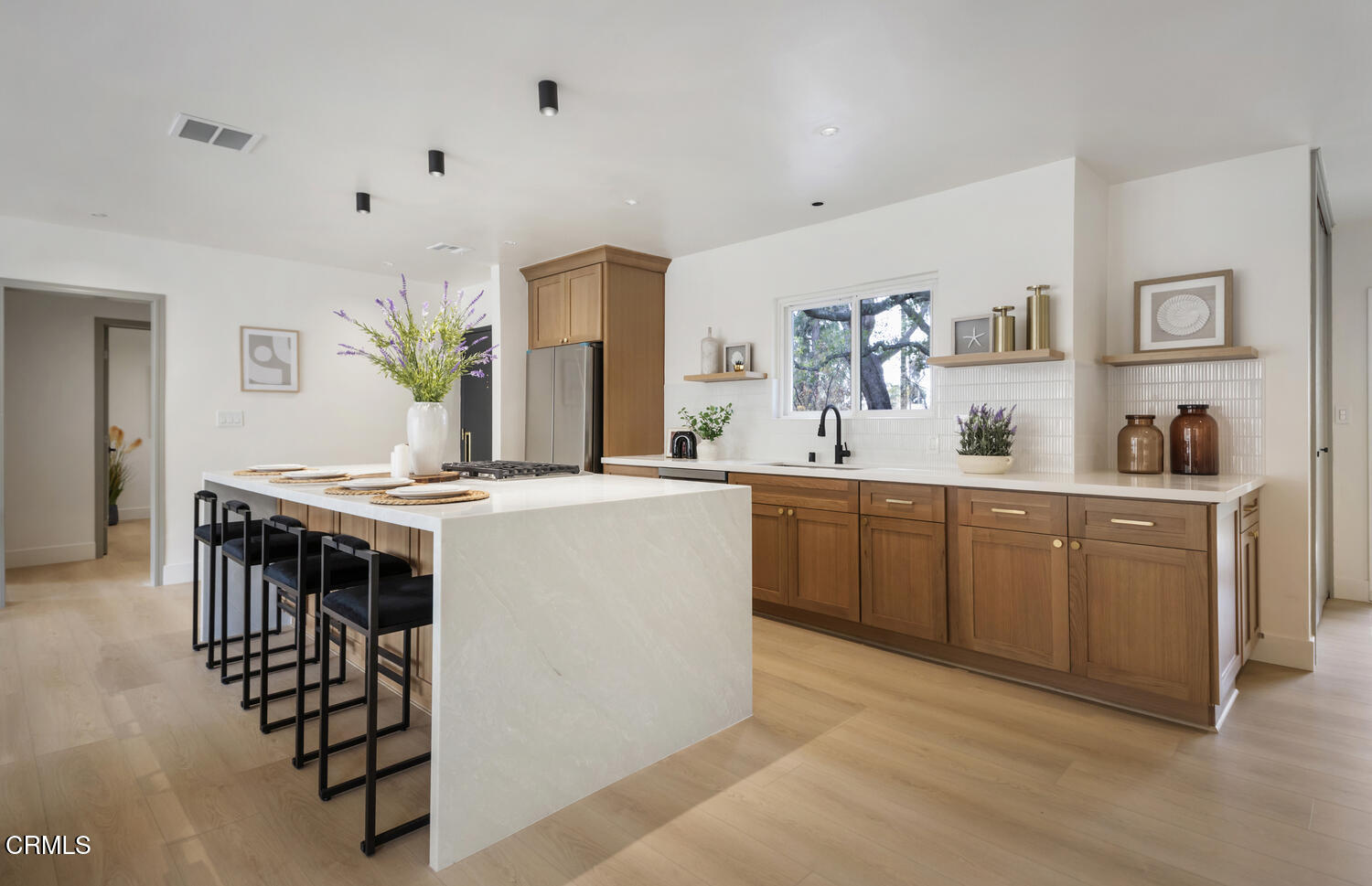 1780 North Altadena Drive Pasadena, CA 91107 - Photo 6 of 34 a kitchen with kitchen island a table and chairs in it