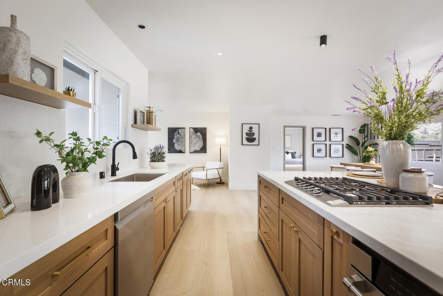 1780 North Altadena Drive Pasadena, CA 91107 - Photo 7 of 34 a kitchen with stainless steel appliances a sink a stove and cabinets