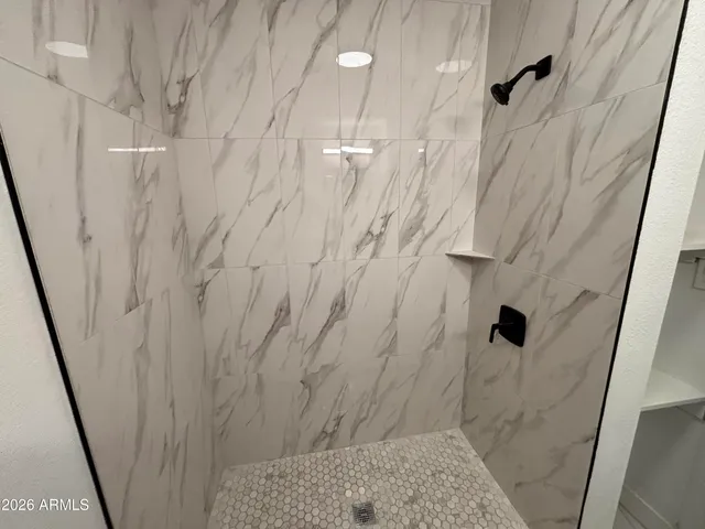 a kitchen with wooden cabinets and a sink