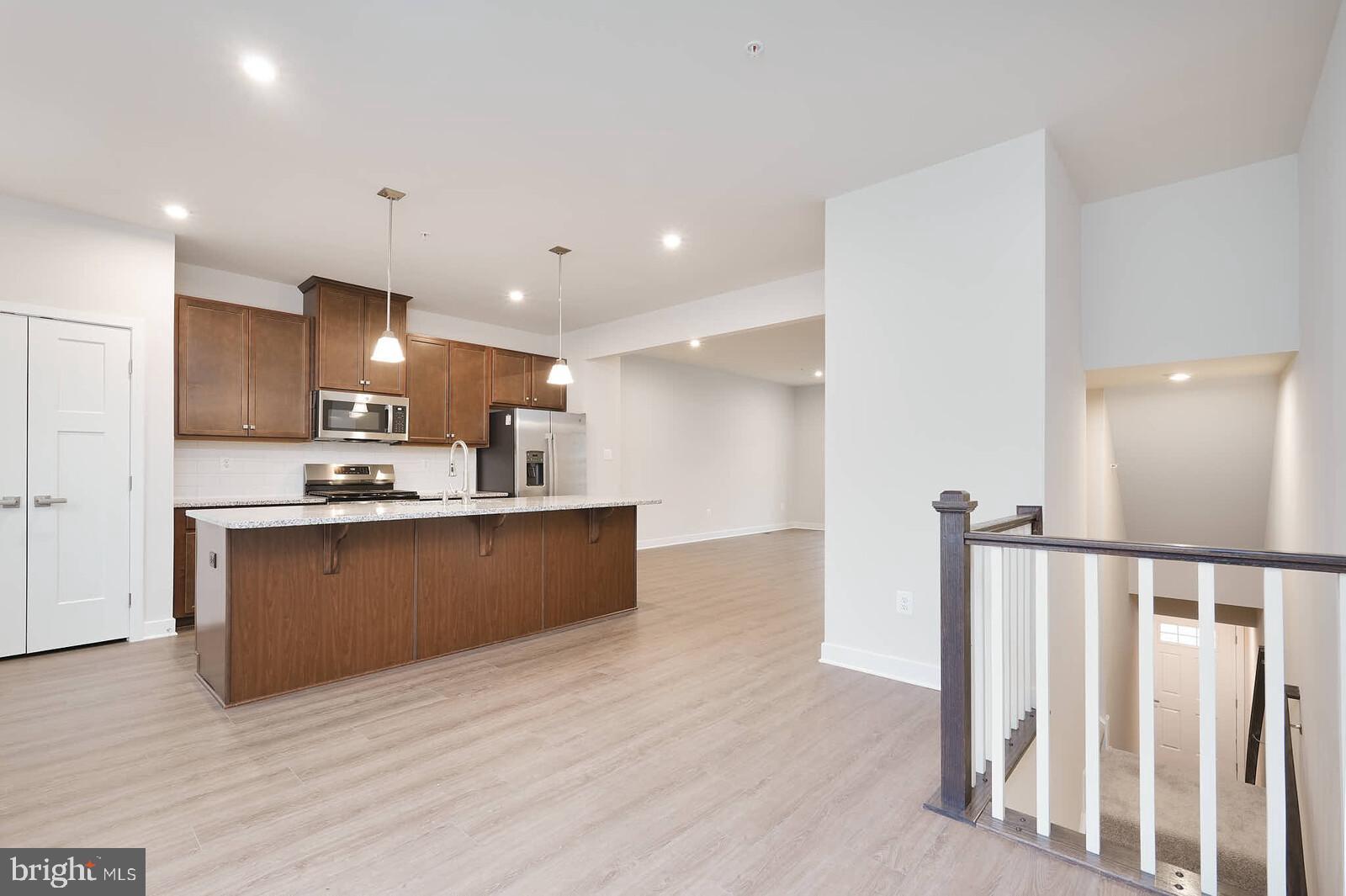 336 Paca Gardens Lane Frederick, MD 21703 - Photo 20 of 36 a view of kitchen with wooden floor