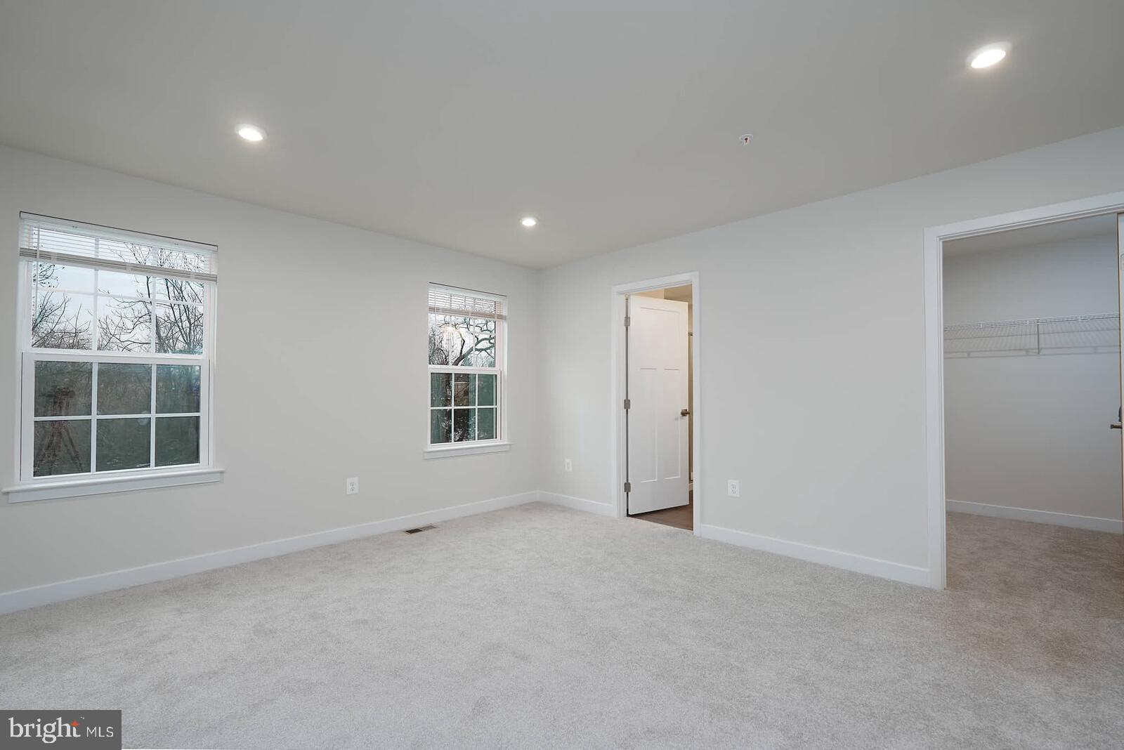 336 Paca Gardens Lane Frederick, MD 21703 - Photo 22 of 36 an empty room with a window