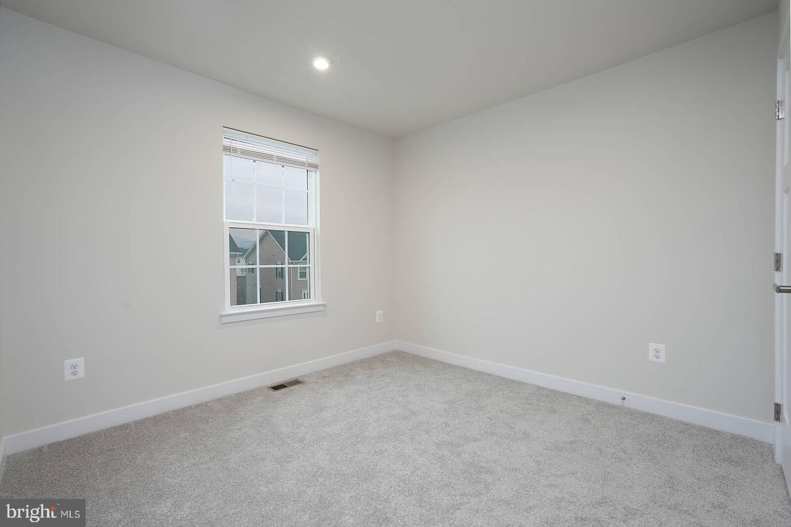 336 Paca Gardens Lane Frederick, MD 21703 - Photo 29 of 36 an empty room with a window