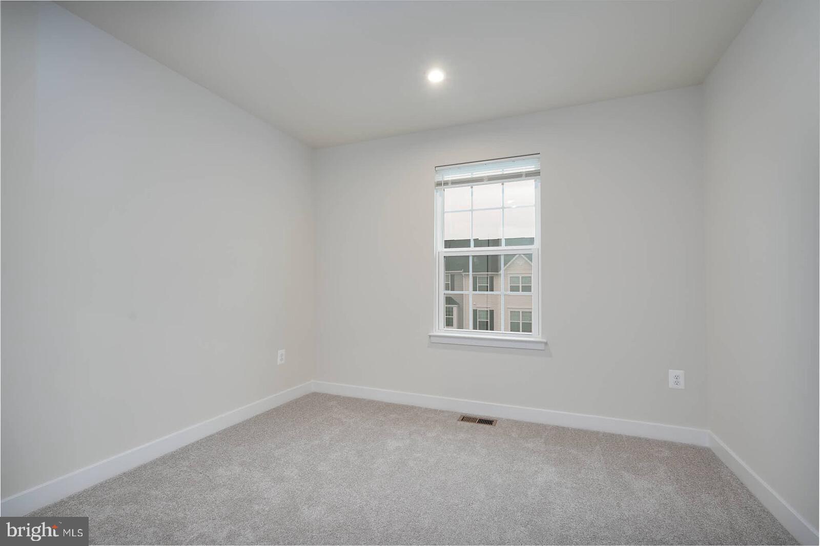336 Paca Gardens Lane Frederick, MD 21703 - Photo 31 of 36 an empty room with a window