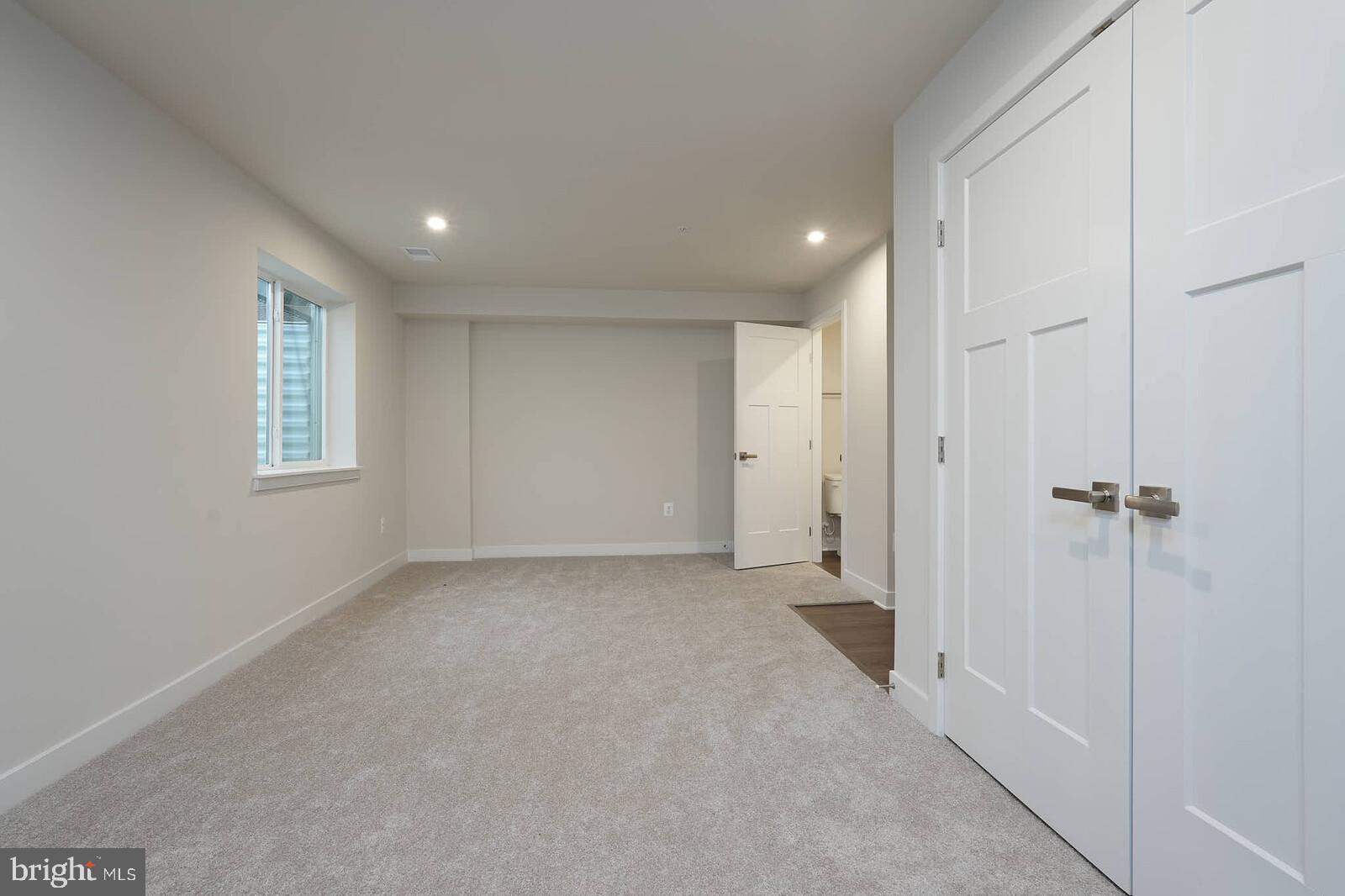 336 Paca Gardens Lane Frederick, MD 21703 - Photo 34 of 36 a view of a big room with windows and closet