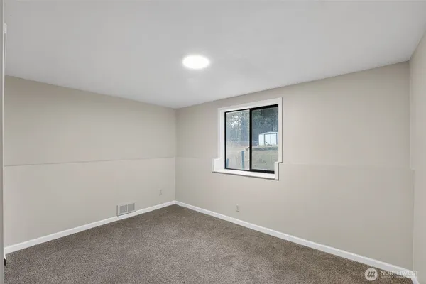 a bathroom with a sink toilet tub and shower