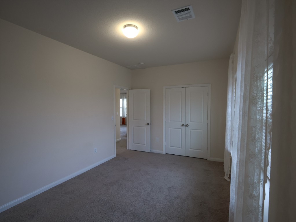 14008 Madrigal Lane Austin, TX 78660 - Photo 14 of 18 a view of an empty room