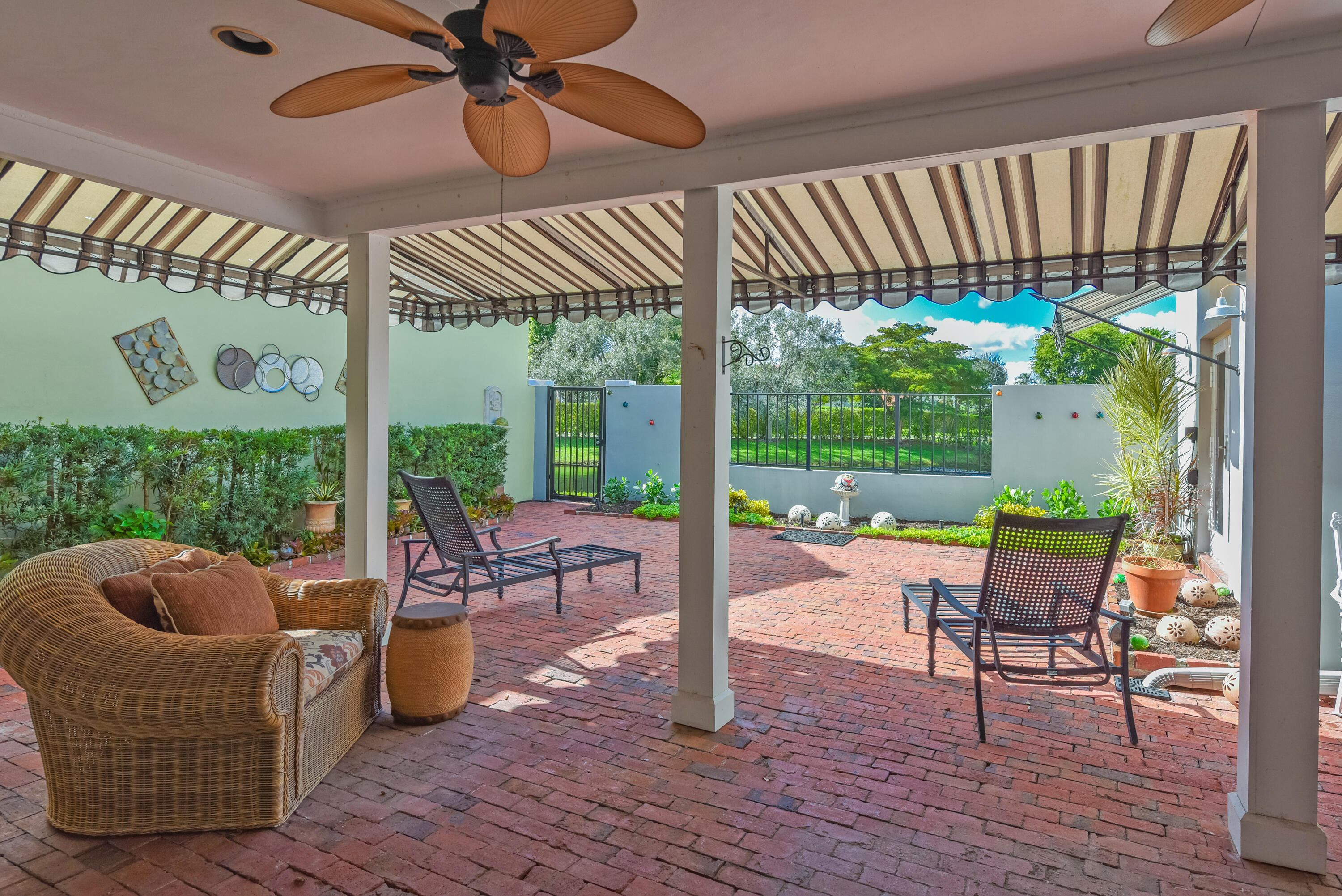 23325 Drayton Drive Boca Raton, FL 33433 - Photo 16 of 44 a outdoor living space with furniture and garden view