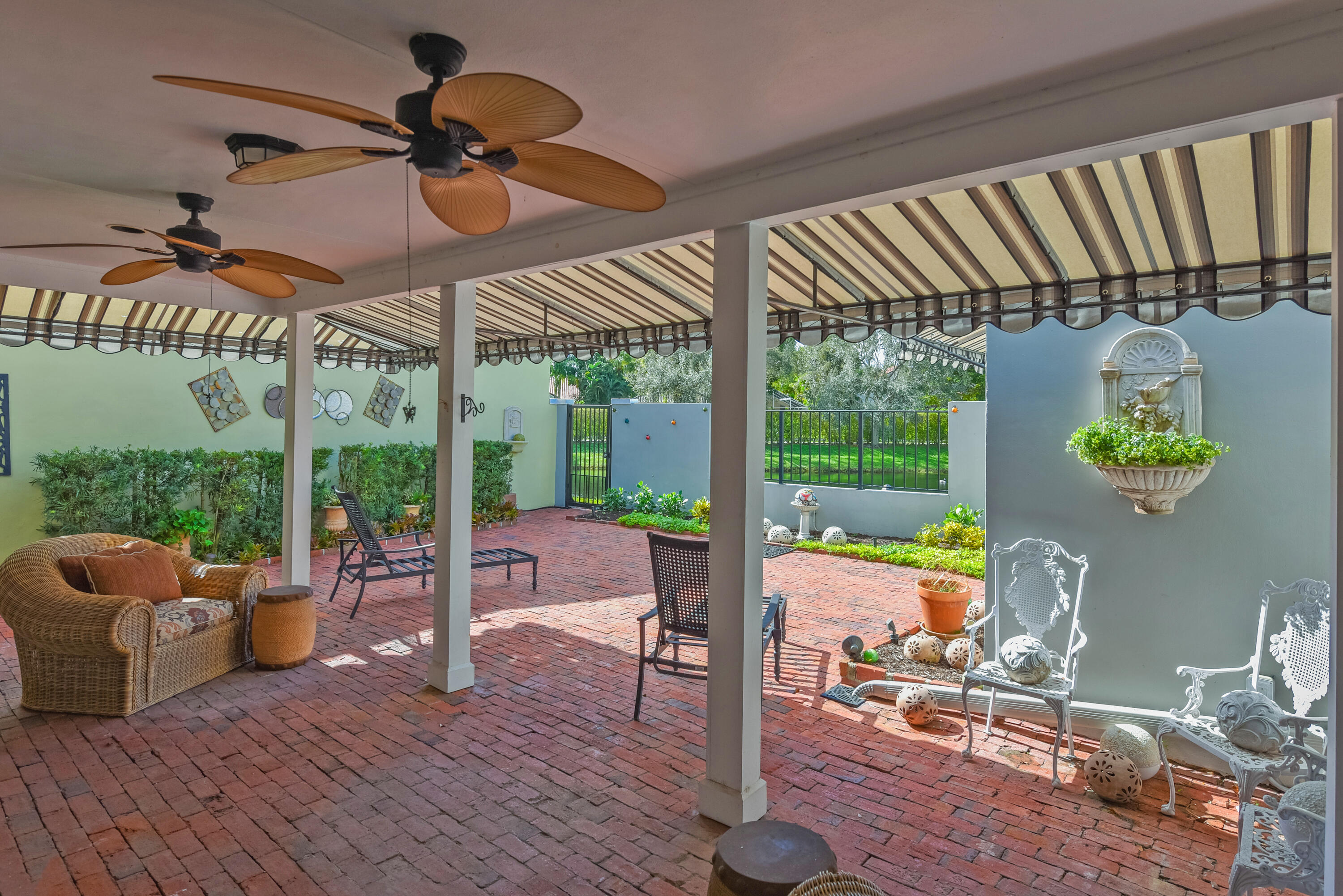 23325 Drayton Drive Boca Raton, FL 33433 - Photo 17 of 44 a view of a livingroom with furniture window and outside view