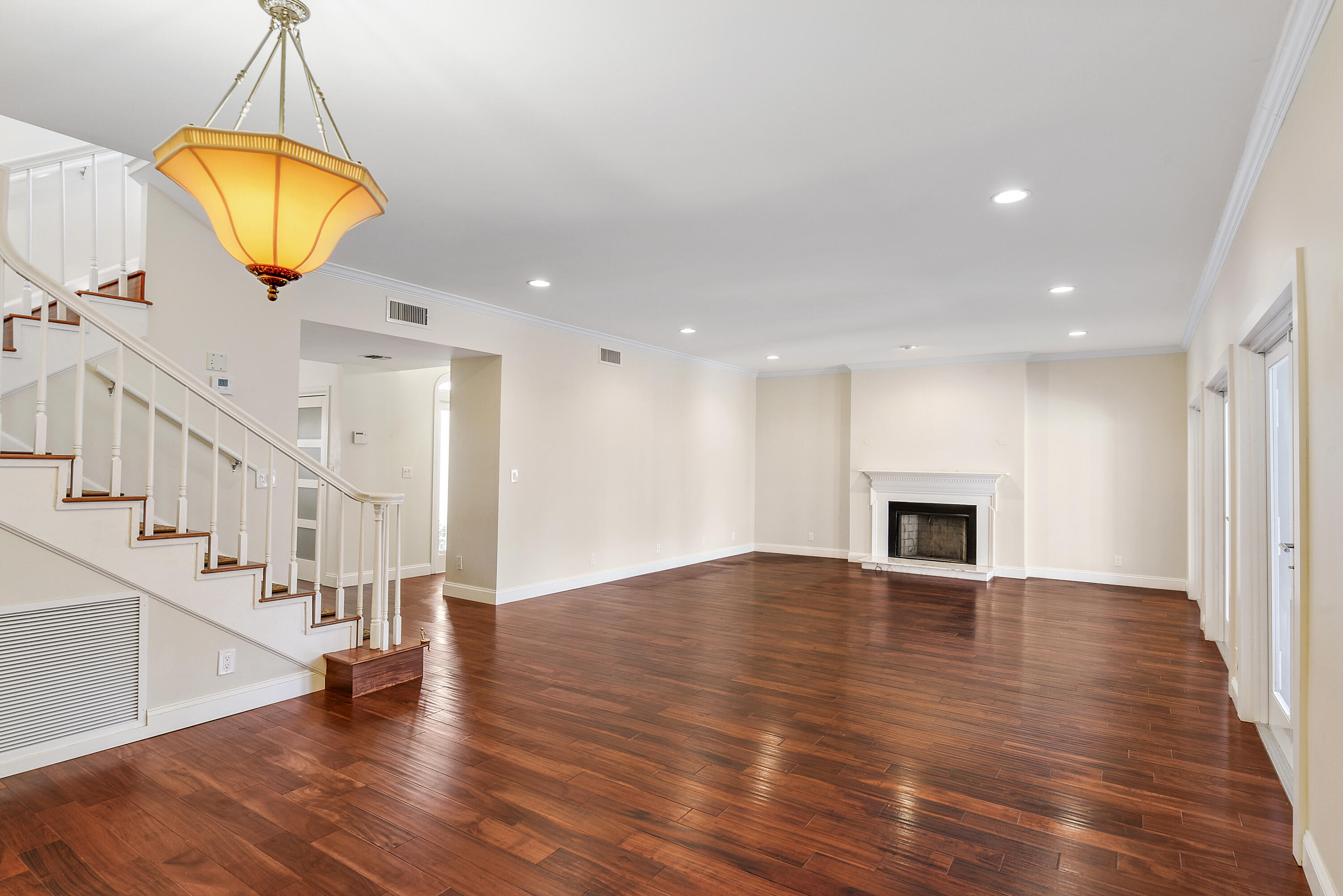 23325 Drayton Drive Boca Raton, FL 33433 - Photo 20 of 44 a view of empty room with wooden floor