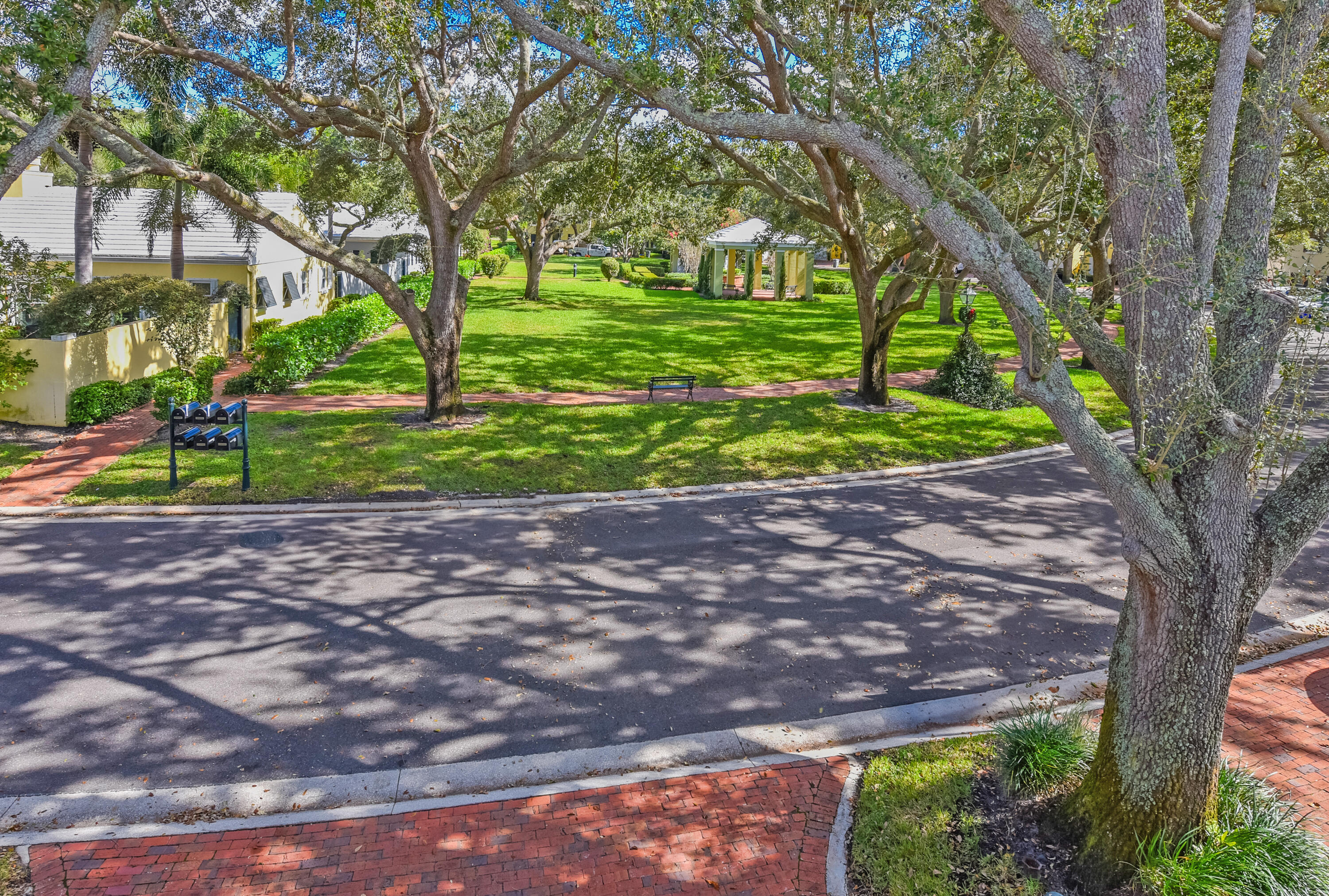23325 Drayton Drive Boca Raton, FL 33433 - Photo 32 of 44 a view of a backyard with large trees
