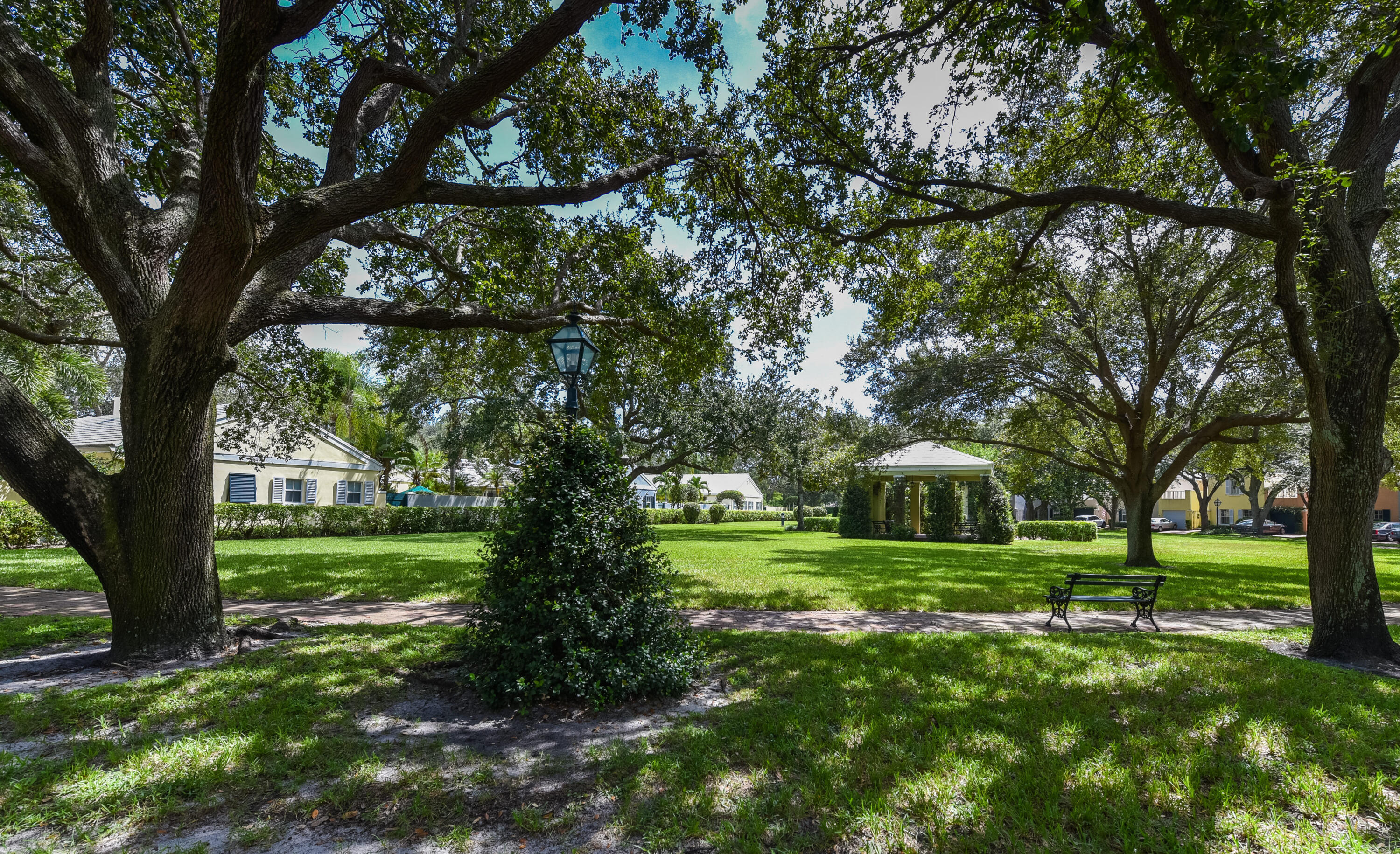 23325 Drayton Drive Boca Raton, FL 33433 - Photo 39 of 44 a view of green field with trees in the background