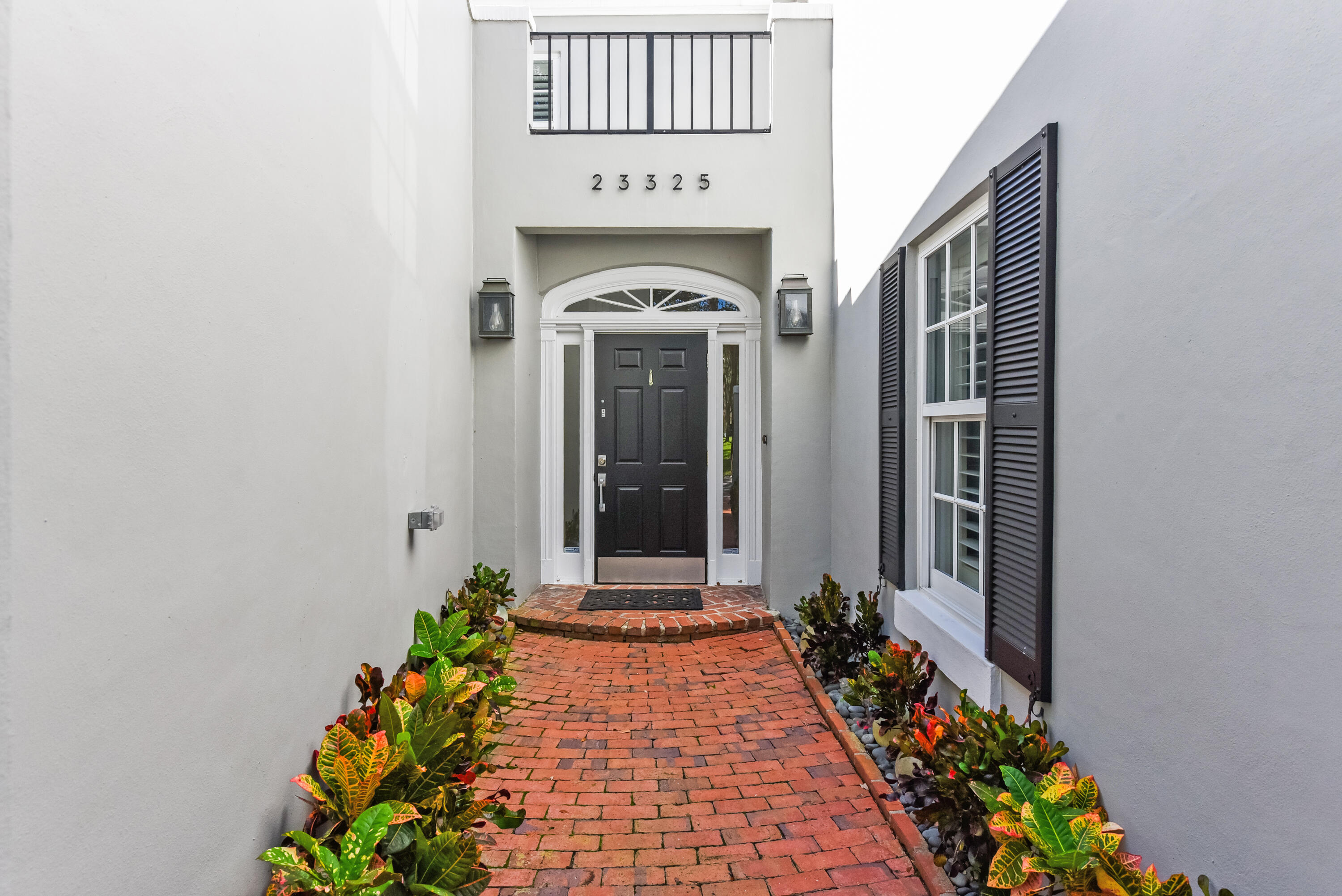 23325 Drayton Drive Boca Raton, FL 33433 - Photo 41 of 44 a front view of a house