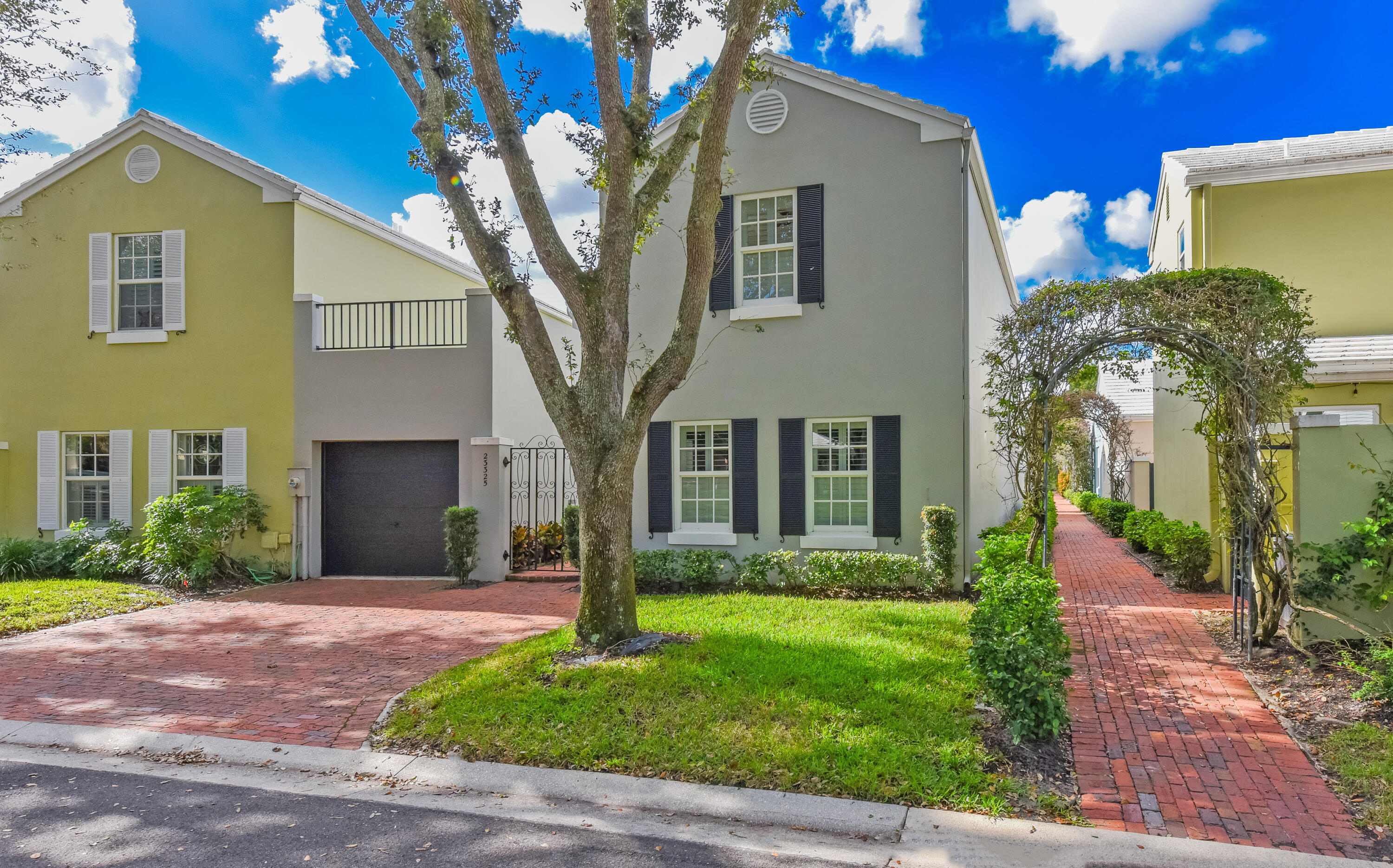 23325 Drayton Drive Boca Raton, FL 33433 - Photo 44 of 44 a front view of a house with garden