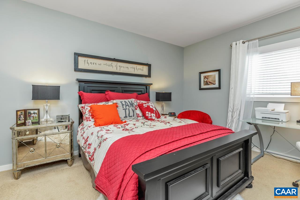 1707 High Ridge Wintergreen, VA 22967 - Photo 23 of 50 a bedroom with a bed and a tv on the dresser