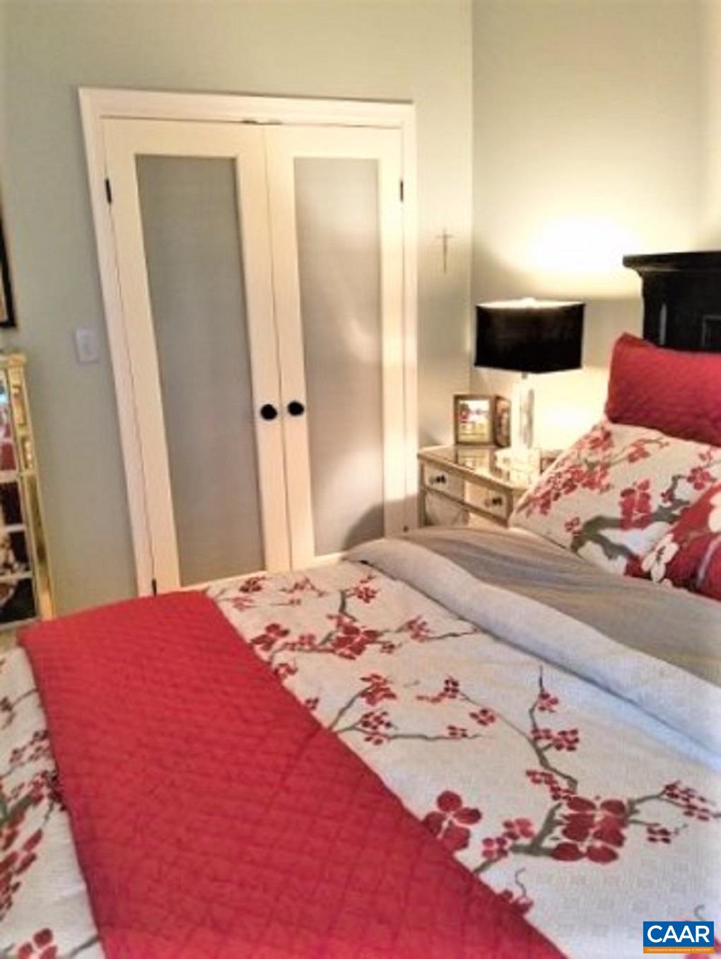 1707 High Ridge Wintergreen, VA 22967 - Photo 26 of 50 a bedroom with a bed and a mirror