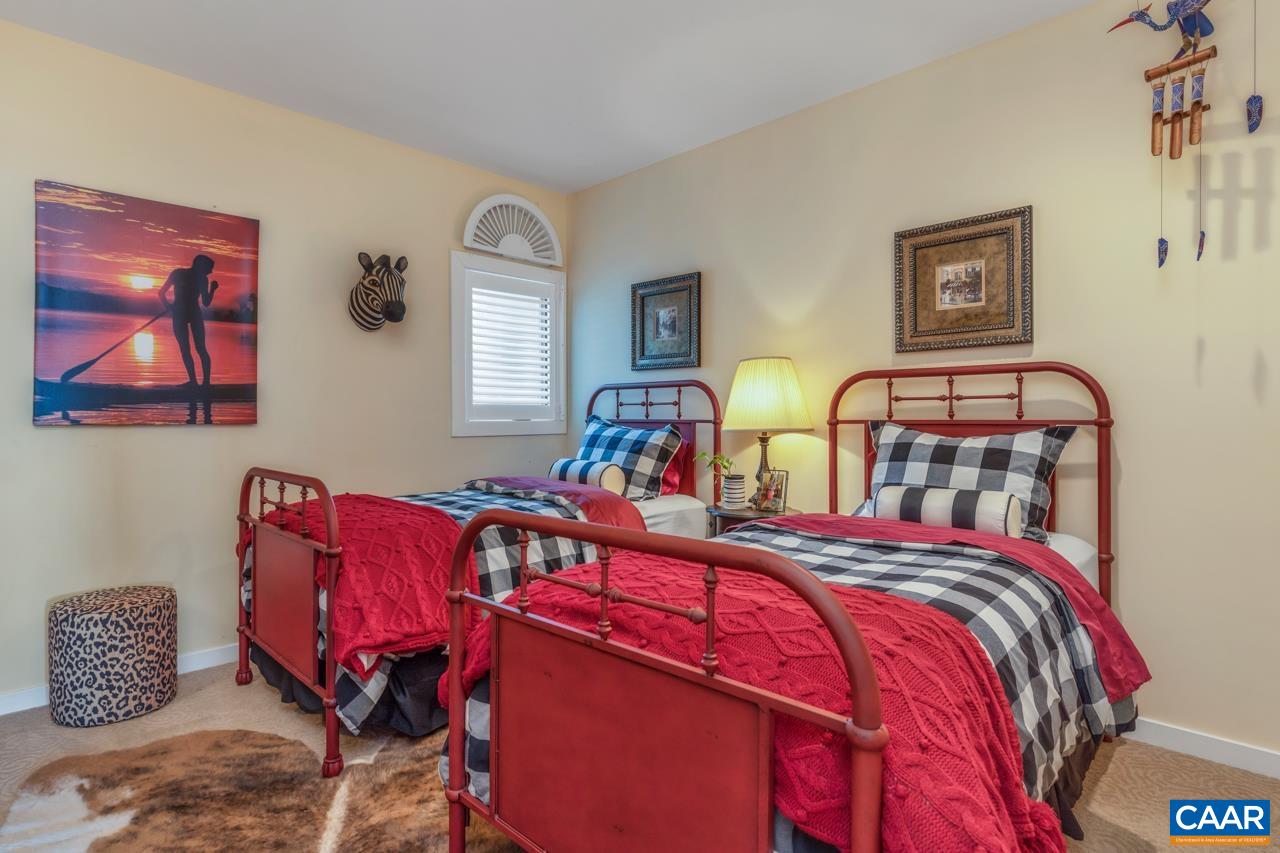 1707 High Ridge Wintergreen, VA 22967 - Photo 33 of 50 a bedroom with two beds and a painting on the wall