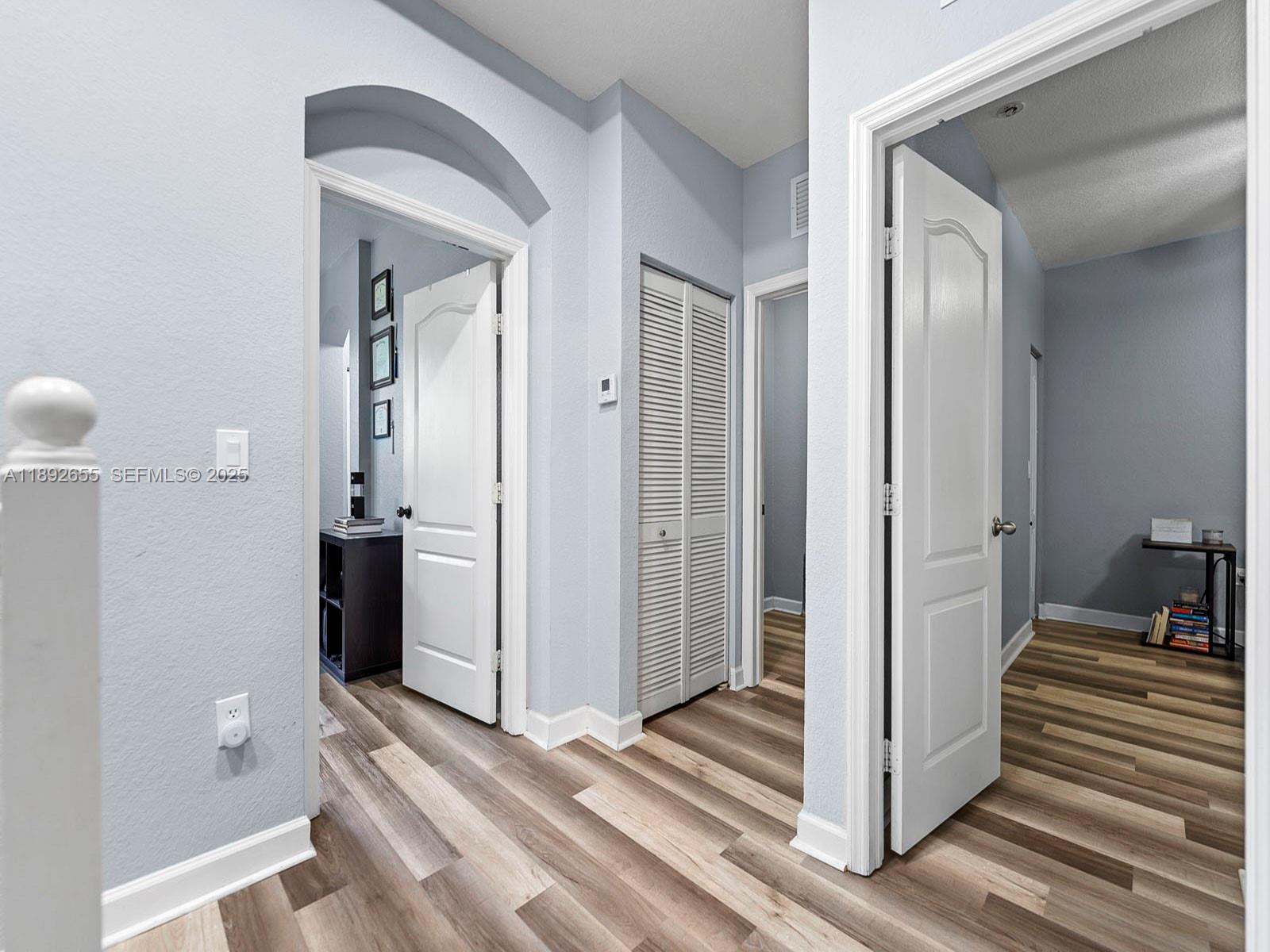11279 Southwest 238th Street Homestead, FL 33032 - Photo 22 of 40 a view of a bathroom from a hallway