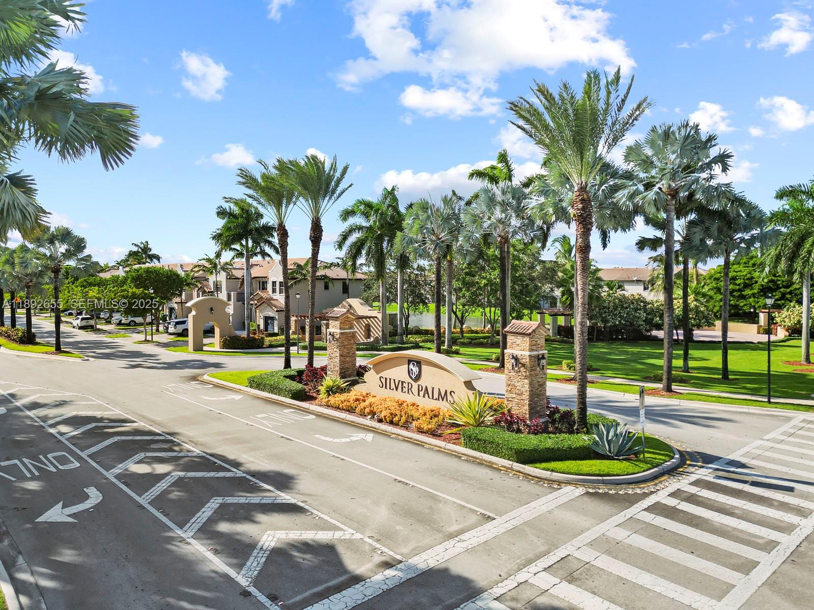11279 Southwest 238th Street Homestead, FL 33032 - Photo 40 of 40 a view of a swimming pool with a patio and palm trees