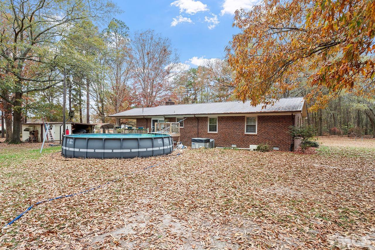 2683 C Rains Crossroads Road Selma, NC 27576 - Photo 25 of 30 a view of a house with a yard