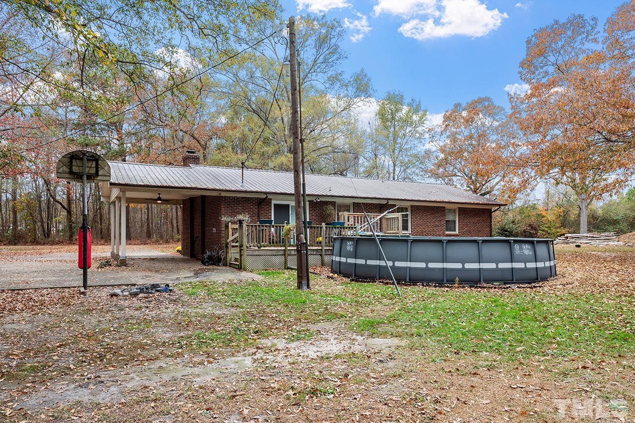 2683 C Rains Crossroads Road Selma, NC 27576 - Photo 26 of 30 a front view of a house with a yard