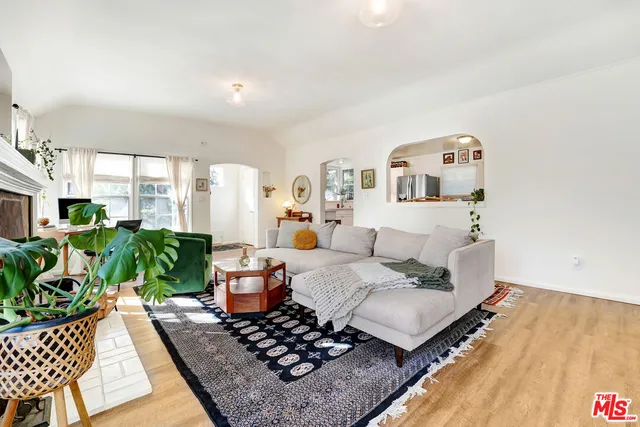 a bedroom with a bed furniture and a window