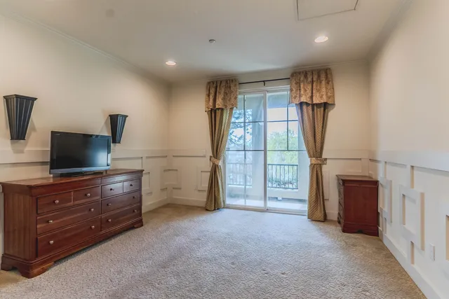 a view of a balcony with wooden floor